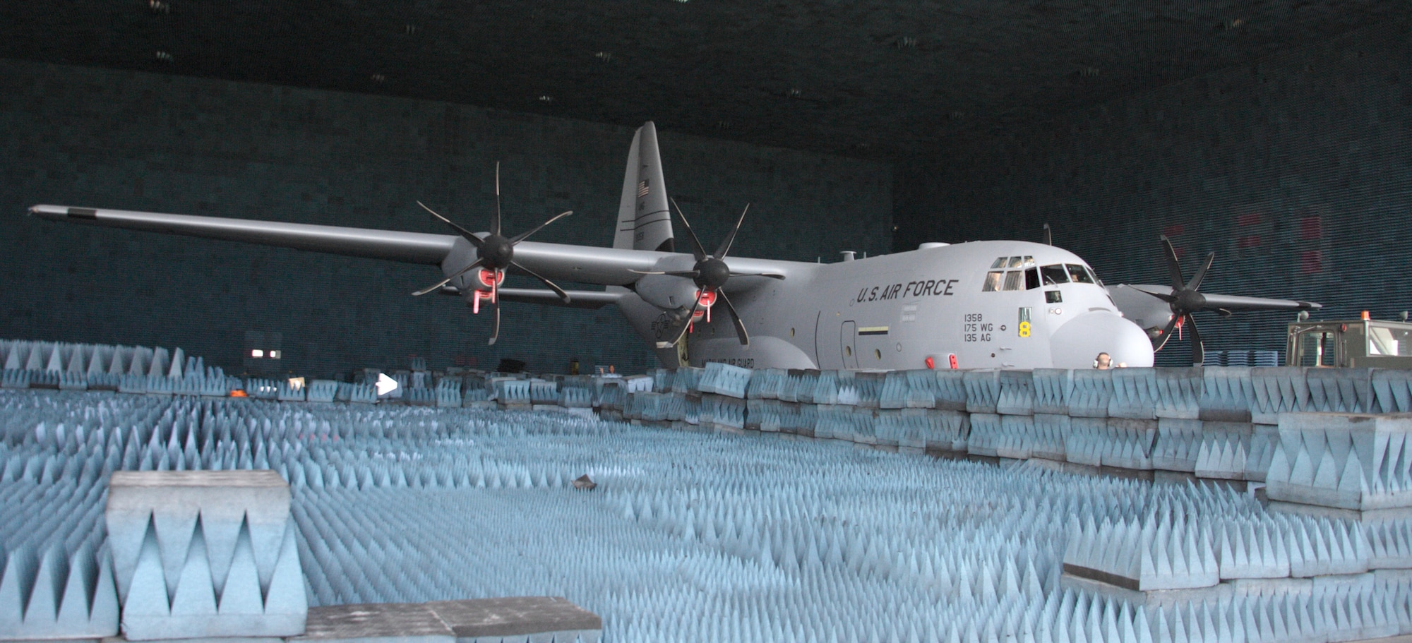 A C-130J Hercules is positioned in the chamber of the Benefield Anechoic Facility here Nov. 8. The facility will be used throughout November for testing of a new radar warning receiver installed in the aircraft. The radar warning receiver detects radio frequency energy from various sources such as enemy surface-to-air missile radars and allows aircrews time to react to a threat. (Photo by Jet Fabara)