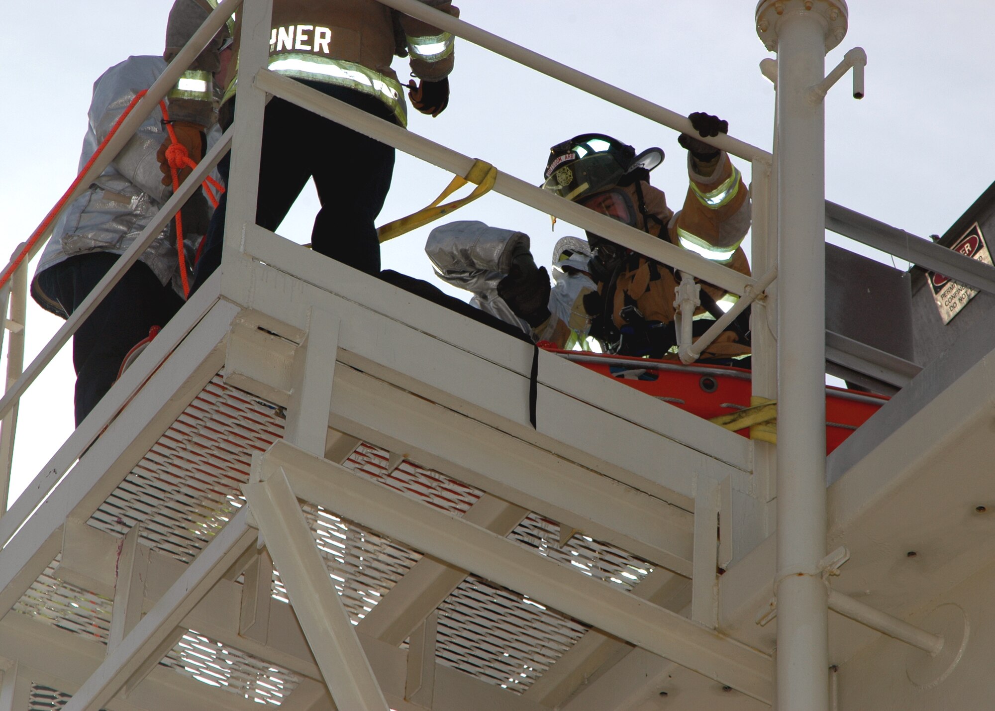 GRISSOM AIR RESERVE BASE, Ind., -- Firefighters form the Grissom Fire Department had a confined space exercise in November. The exercise took place in one of the fuel tanks on base. The purpose of the exercise was to see how efficient the fire department was at rescuing a person in a confined space that may be toxic. The fire department performed well in the annual exercise. (U.S. Air Force photo/Senior Airman Carl Berry)