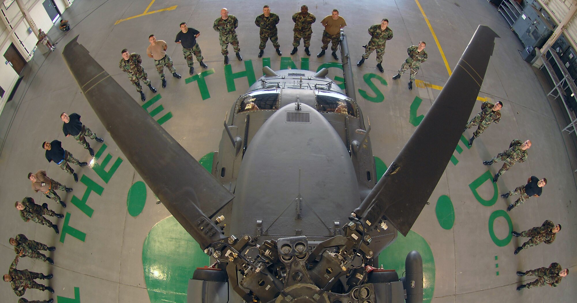 Helicopter maintainers of the 723rd Aircraft Maintenance Squadron gather around an HH-60G Pave Hawk combat search and rescue helicopter Oct. 25 at Moody Air Force Base, Ga. Maintainers prepare their aging aircraft for daily missions to support their motto, "These things we do ... that others may live." (U.S. Air Force photo/Airman 1st Class Brittany Barker) 
