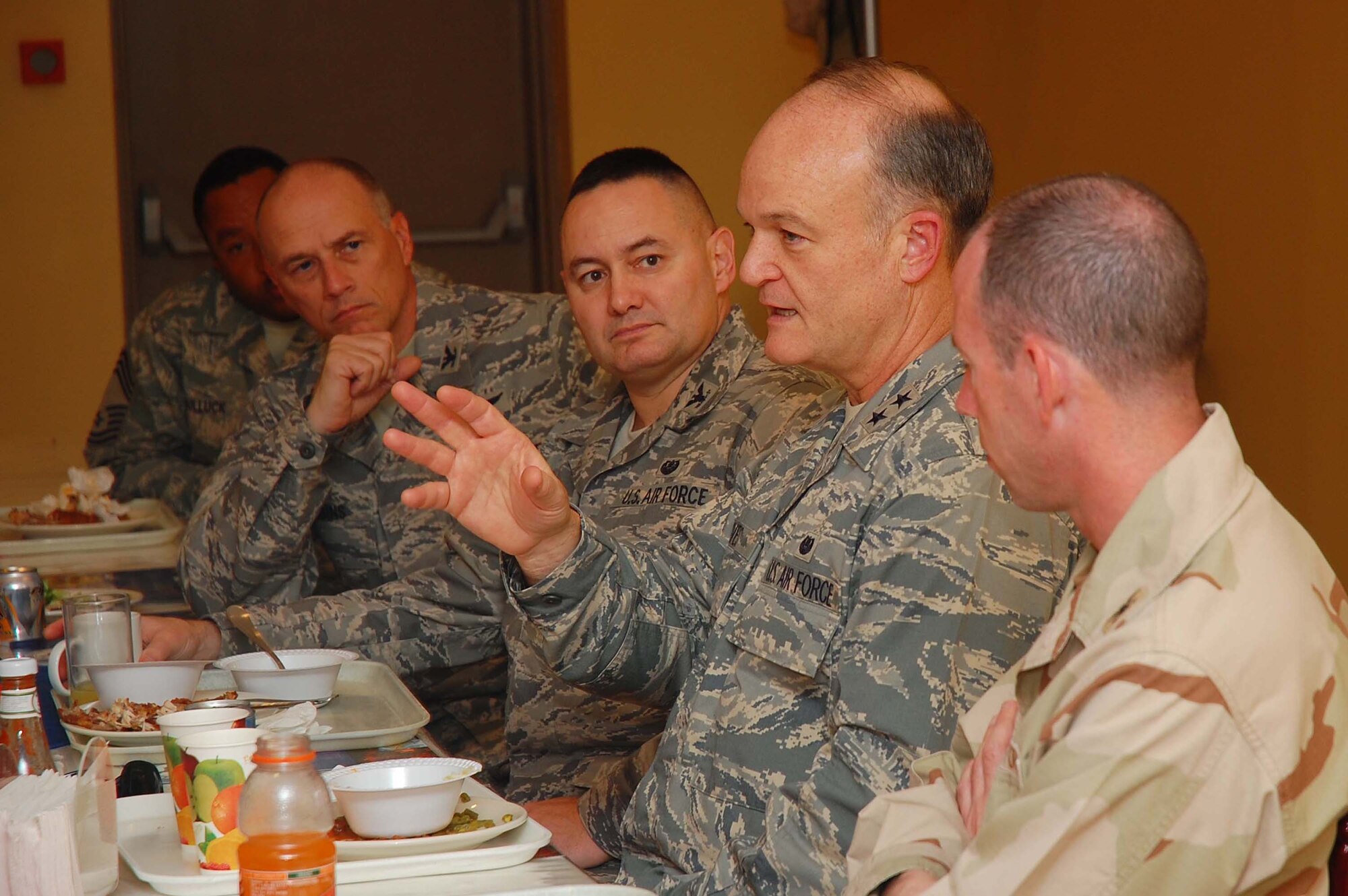SOUTHWEST ASIA -- Maj. Gen. Jack Rives, Air Force judge advocate general, visits with 386th Expeditionary Wing leadership at an undisclosed location in Southwest Asia Nov. 8.  General Rives' visit included reviewing the 386 AEW legal programs and meeting with deployed Airmen from units around the world.  (U.S. Air Force photo by Staff Sgt. Tia Schroeder)  