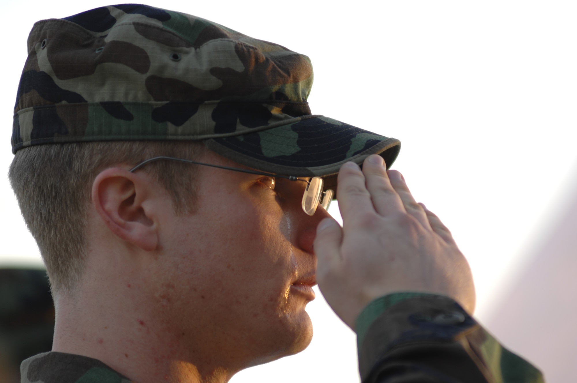 AVIANO AIR BASE, Italy--An Airmen from the 31st Fighter Wing salutes during a repatriation ceremony Nov. 13 for six servicemembers who were killed when a U.S. Army UH-60 Black Hawk helicopter attached to the 1st Battalion, 214th Aviation Regiment crashed Nov. 8, 22 miles southwest of Aviano, Italy.  (U.S. Air Force photo/Airman 1st Class Tabitha Mans) 