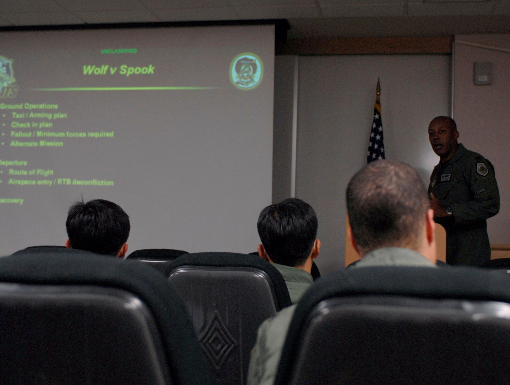 KUNSAN AIR BASE, South Korea--   Col. C.Q "Wolf" Brown 8th Fighter Wing commander, briefs pilots from the Republic of Korea Air Force's (ROKAF), 111th Fighter Squadron, along with pilots from the 8th Fighter Wing here Nov. 14. ROKAF pilots and Wolf Pack pilots trained together on a joint mission to give pilots from both countries a chance to work together and hone their war-fighting skills.  (U.S. Air Force Photo/Staff Sgt. Araceli Alarcon) 