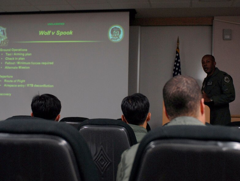 KUNSAN AIR BASE, South Korea--   Col. C.Q "Wolf" Brown 8th Fighter Wing commander, briefs pilots from the Republic of Korea Air Force's (ROKAF), 111th Fighter Squadron, along with pilots from the 8th Fighter Wing here Nov. 14. ROKAF pilots and Wolf Pack pilots trained together on a joint mission to give pilots from both countries a chance to work together and hone their war-fighting skills.  (U.S. Air Force Photo/Staff Sgt. Araceli Alarcon) 