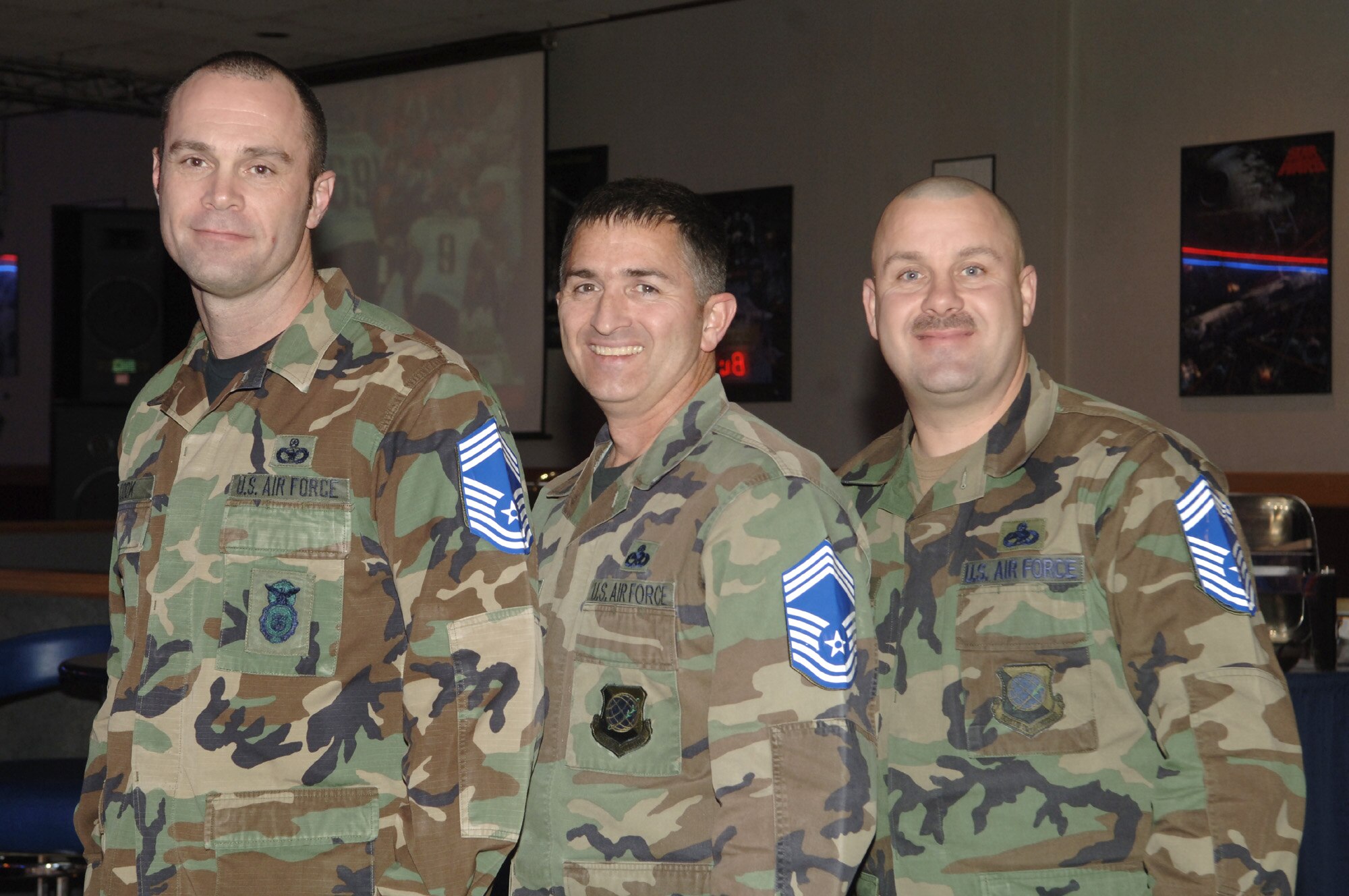 FAIRCHILD AIR FORCE BASE, Wash. -- From left to right, Chief Master Sgts. Select Tim Cook, 92nd Security Forces Squadron; Michael Joyner, 92nd Maintenance Squadron; and Warren Scott, 92nd Aircraft Maintenance Squadron, were recently selected to become chief master sergeants Nov. 14. (U.S. Air Force photo / Senior Airman Chad Watkins)