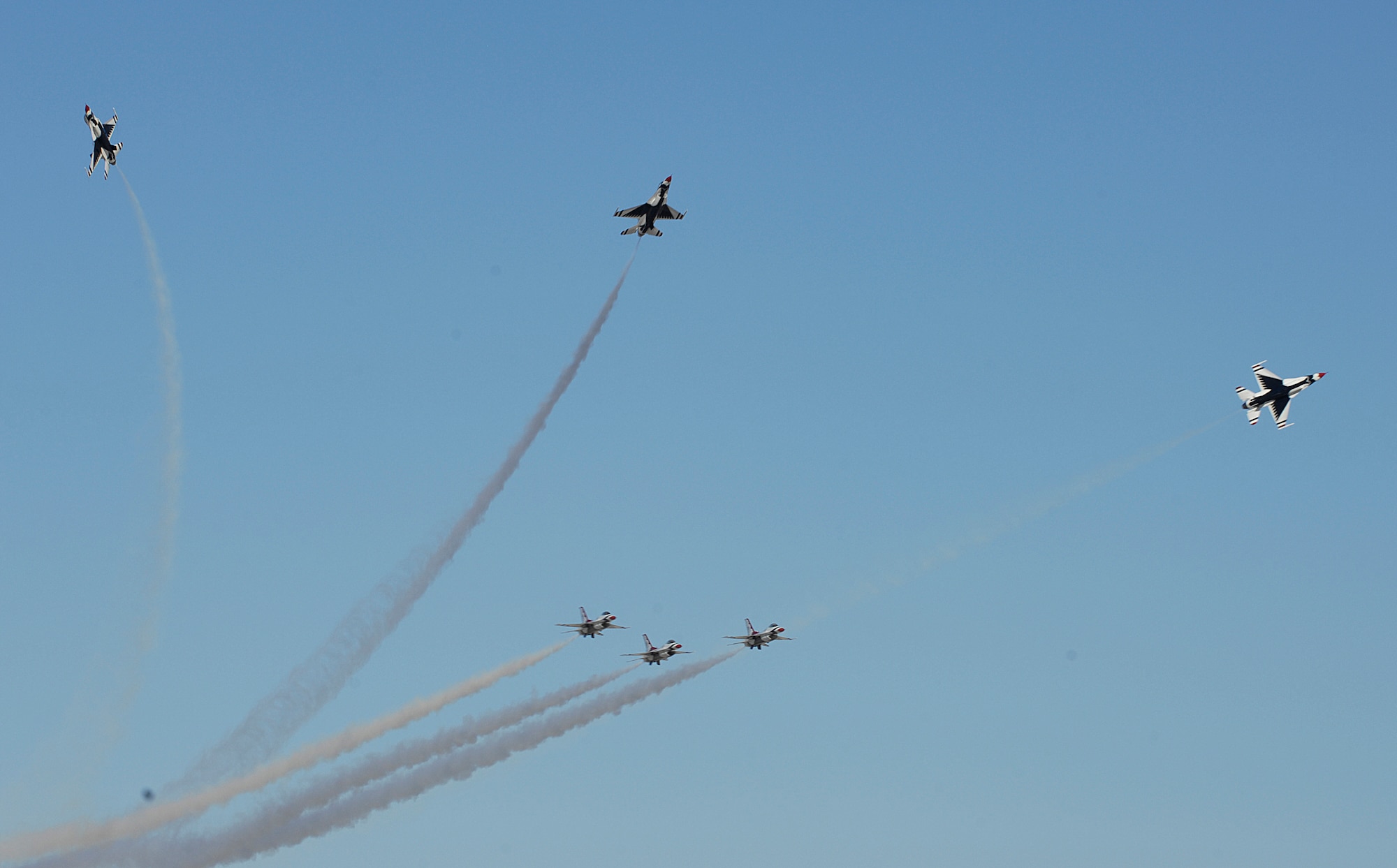 NELLIS AIR FORCE BASE, Nev. -- The Thunderbirds tear through the skies of Las Vegas during their performance  for the 60th Anniversary Air Show  here on Nov. 10. The Thunderbirds, commemorating their 54th season and the 60th Anniversary of the Air Force, traveled across the country and the world to represent the 515,000 men and women of the United States Air Force. (U.S. Air Force photo/Airman 1st Class Matthew Plew)