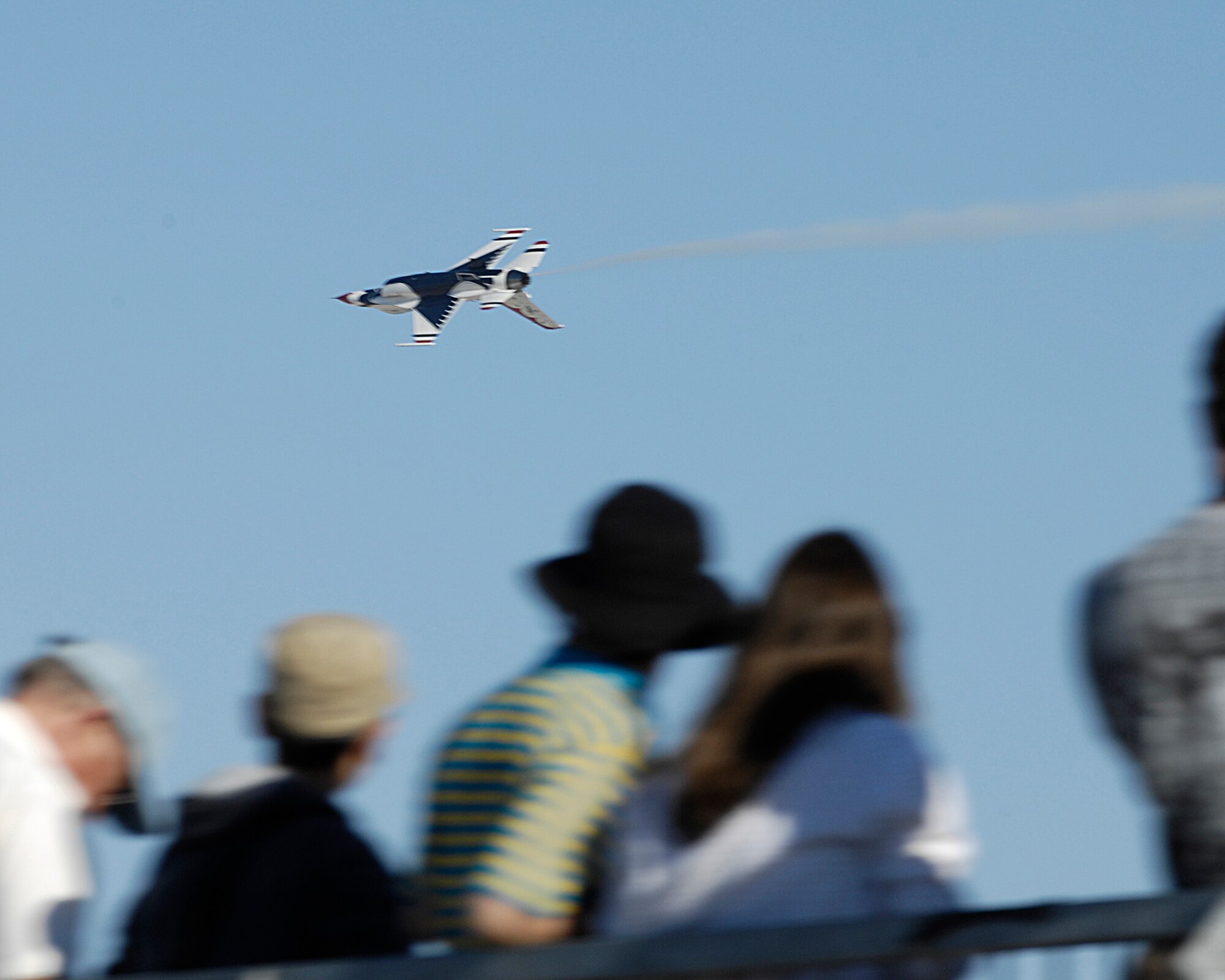 NELLIS AIR FORCE BASE, Nev. -- The Thunderbirds tear through the skies of Las Vegas during their performance  for the 60th Anniversary Air Show Nov. 10, here. The Thunderbirds, commemorating their 54th season and the 60th Anniversary of the Air Force, traveled across the country and the world to represent the 515,000 men and women of the United States Air Force. (U.S. Air Force photo/Airman 1st Class Matthew Plew)