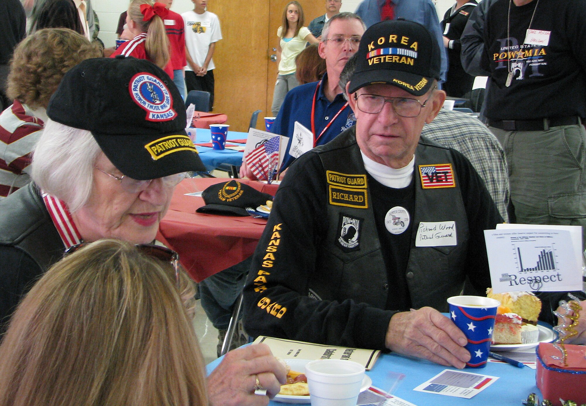 MCCONNELL AIR FORCE BASE, Kan. -- Korean War vet, Richard Wood enjoyed the ceremony with his wife, Joyce, of 54 years.  They continue their service now as members of the Patriot Guard. (Photo by Marissa Hildebrand, courtesy of Derby Middle School)