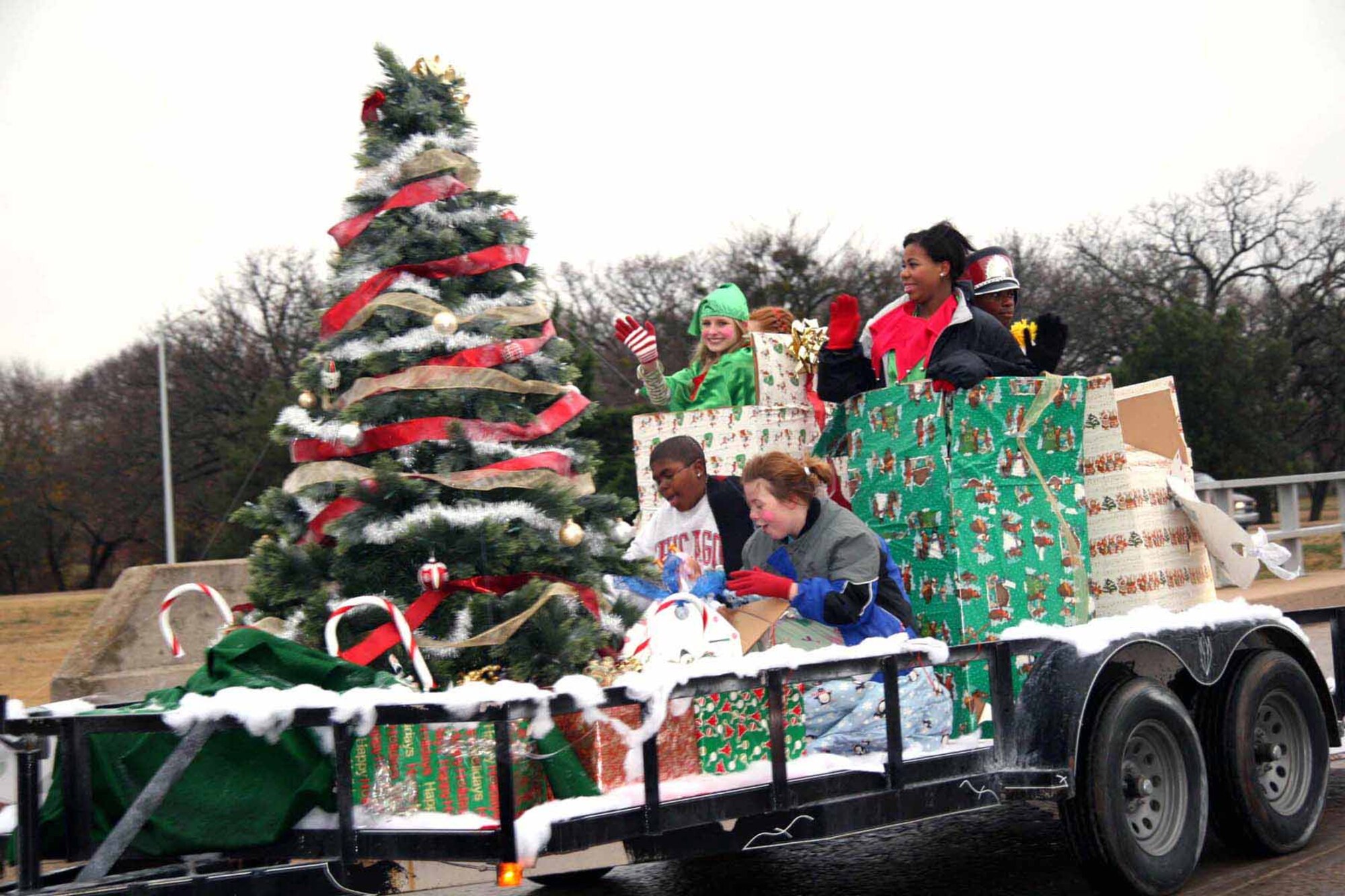 Tinker Youth Center’s float in last year’s parade celebrated the season. This year’s parade and tree lighting will begin at 4:30 p.m. Nov. 28. The theme is “Celebrating an Oklahoma Centennial and the Air Force’s 60th Anniversary.” (Air Force photo by Becky Pillifant)