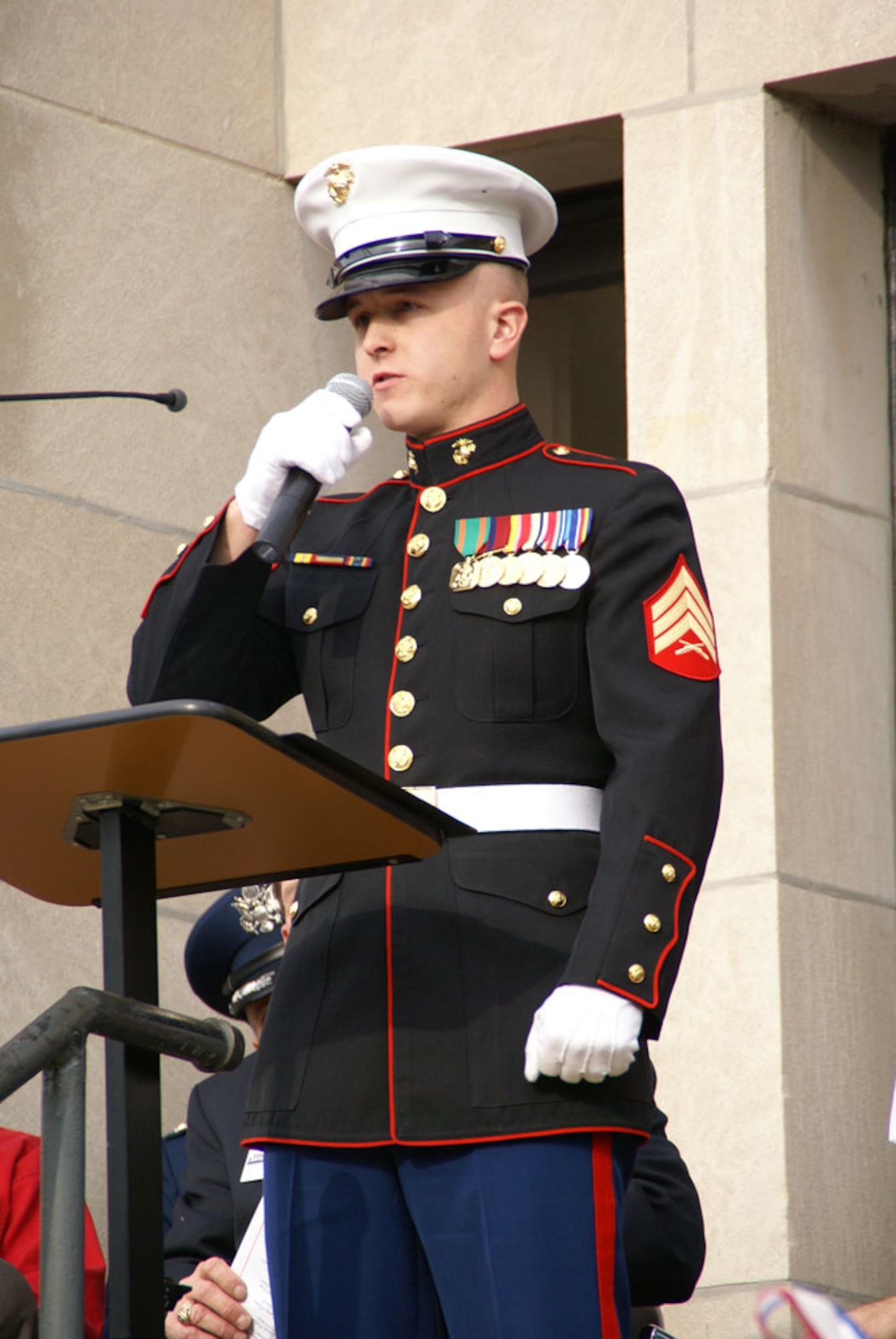 Marine Sgt. Curtis Hice sings “God Bless the USA” at Operation Never Forget’s unveiling ceremony Nov. 11. (Photo by Philip Lorenz III)