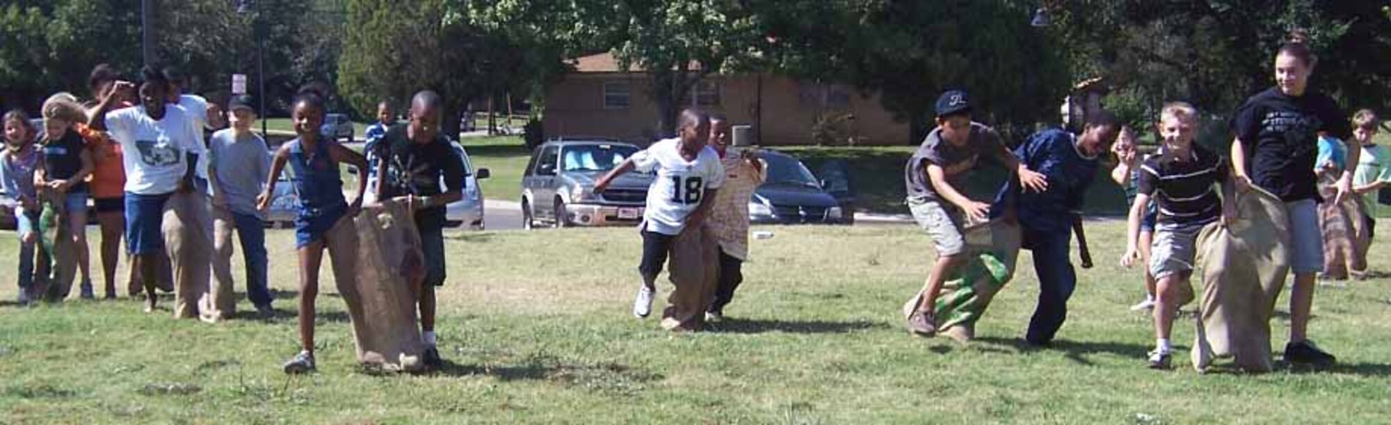 During the Worldwide Day of Play, participants competed in a sack race at the youth center. (Courtesy photo)