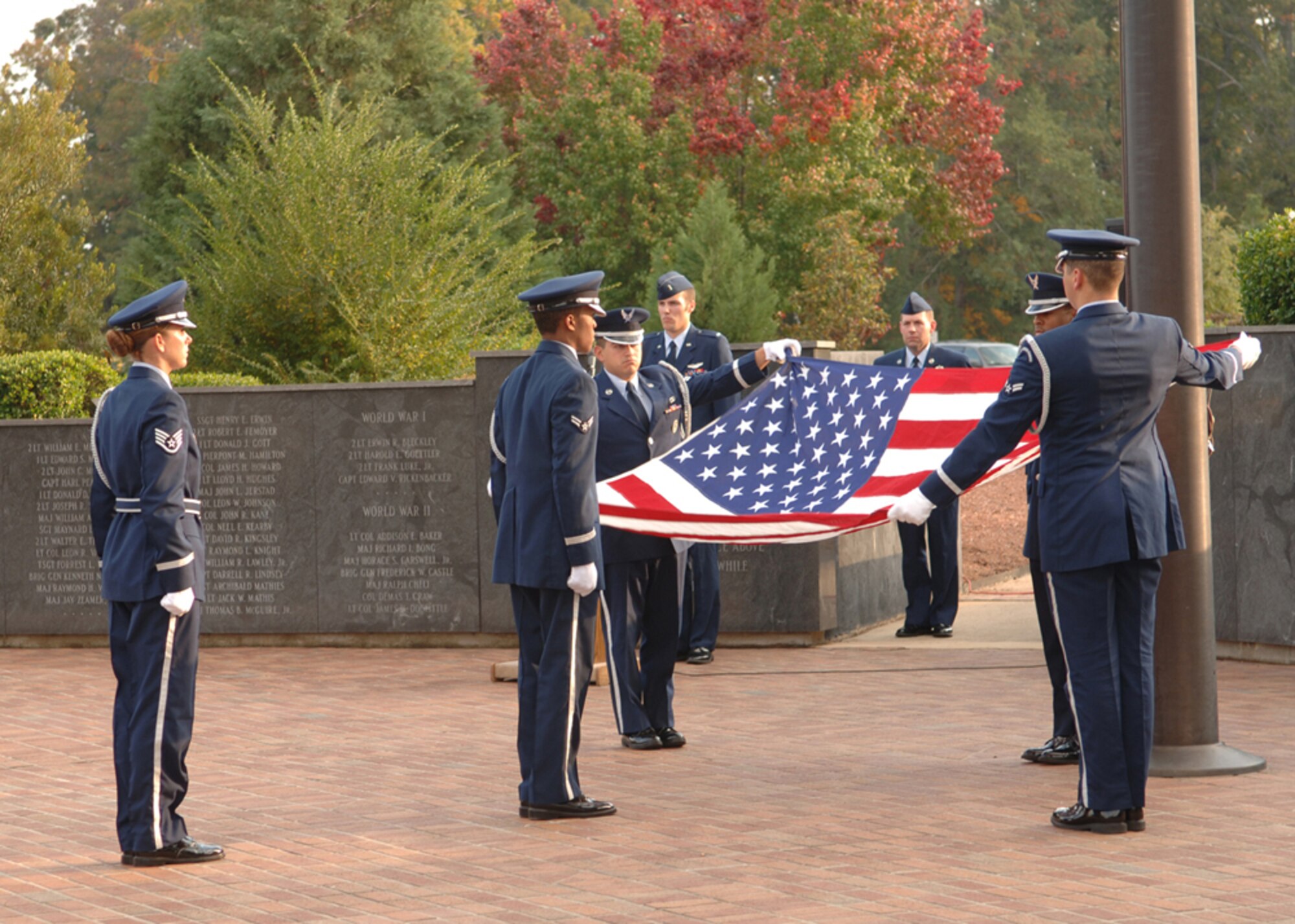 Members of the 14th Flying Training Wing Honor Guard fold the flag during the Veterans Day retreat ceremony Tuesday. During the ceremony, veterans, both past and present, were honored. (U.S. Air Force photo by Elizabeth Owens)
