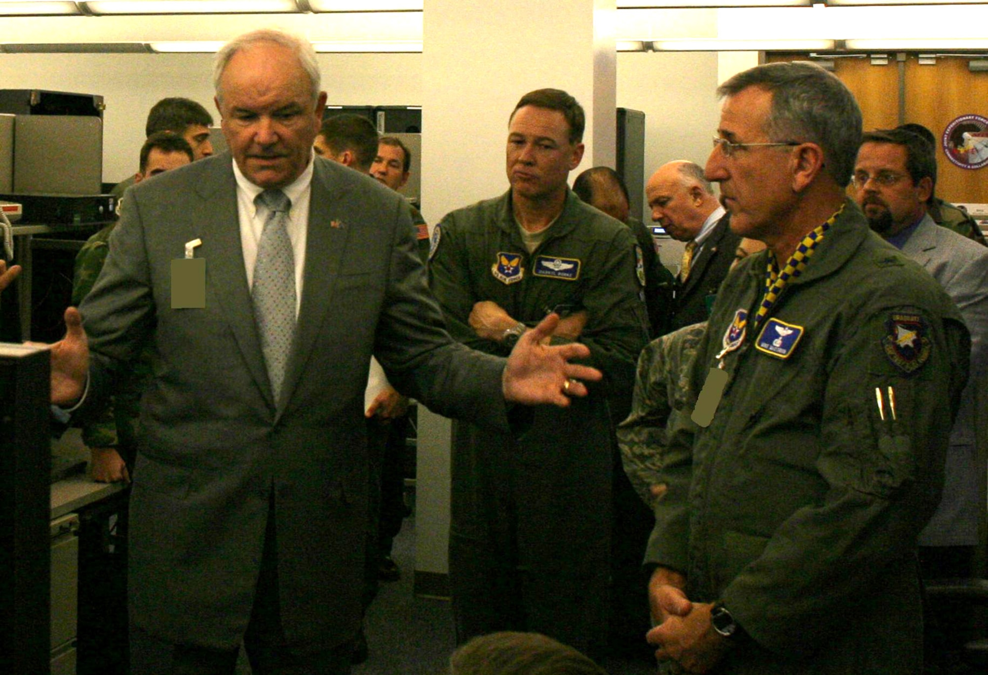 Secretary of the Air Force Michael Wynne (left) talks with Brig. Gen. Mike H. McClendon Nov. 13 during a tour of the Air Force Global Cyberspace Integration Center Hot Bench. Secretary Wynne visited the center for an inside look at the Joint Expeditionary Force Experiment 2008. General McClendon is the AF GCIC commander. (U.S. Air Force Photo/1st Lt. Charlie Spaulding) 