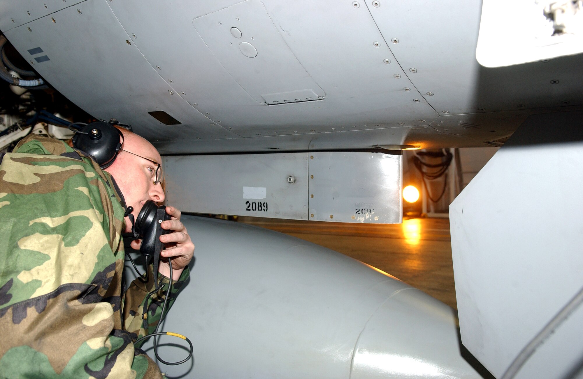 Crew Chief Staff Sgt. Patrick Etherson inspects an F-16 Fighting Falcon prior to take-off Nov. 14 during Exercise Keen Sword at Misawa Air Base, Japan. More than 60 military units from 24 locations participated in the exercise designed to improve interoperability between the Japanese Air Self Defense Force and U.S. forces. Sergeant Etherson is with the 35th Aircraft maintenance Squadron. (U.S. Air Force photo/Senior Airman Robert Barnett) 
