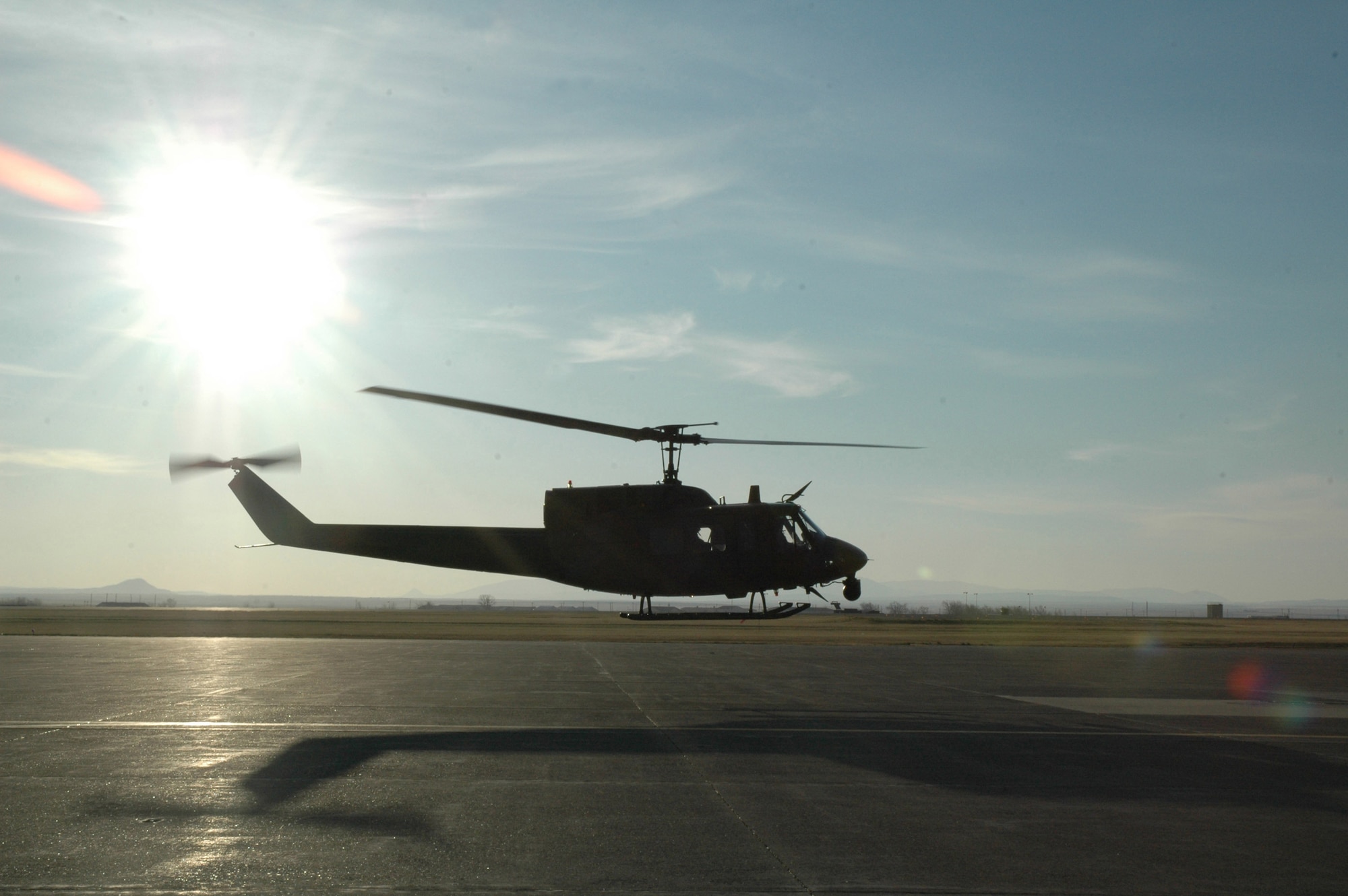 Capts. Daran Gaus and Ben Brown, both pilots with the 40th Helicopter Squadron, hover over the flightline in their "Huey" at Malmstrom Air Force Base, Mont., Oct. 31. The UH-1N Huey is a light-lift utility helicopter used to support Air Force Space Command missile wings and groups. (U.S. Air Force photo/Senior Airman Eydie Sakura)