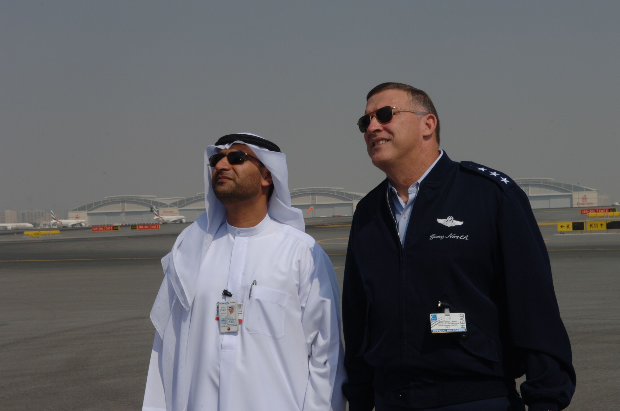 Mohammed A. Lengawi, General Manager of Airport safety and Crisis management for the government of Dubai, gives Lt. Gen. Gary North, commander of 9th Air Force and U.S. Central Command Air Forces, a tour of the Mobil Incident Command Center used by the Government of Dubai's Department of Civil Aviation.  The MICC is a state of the art facility and is on stand-by in case of any emergency that may arise during the Dubai Air Show. Approximately 250 Airman, Soldiers and Sailors, and various Air Force and Navy aircraft from bases in the Persian Gulf region and  the United States are supporting the air show from Nov 11-15 2007.   The United States military is a long-standing participant in the biennial Dubai Air Show.  (Air Force Photo by Tech. Sgt. Charlein C. Sheets)