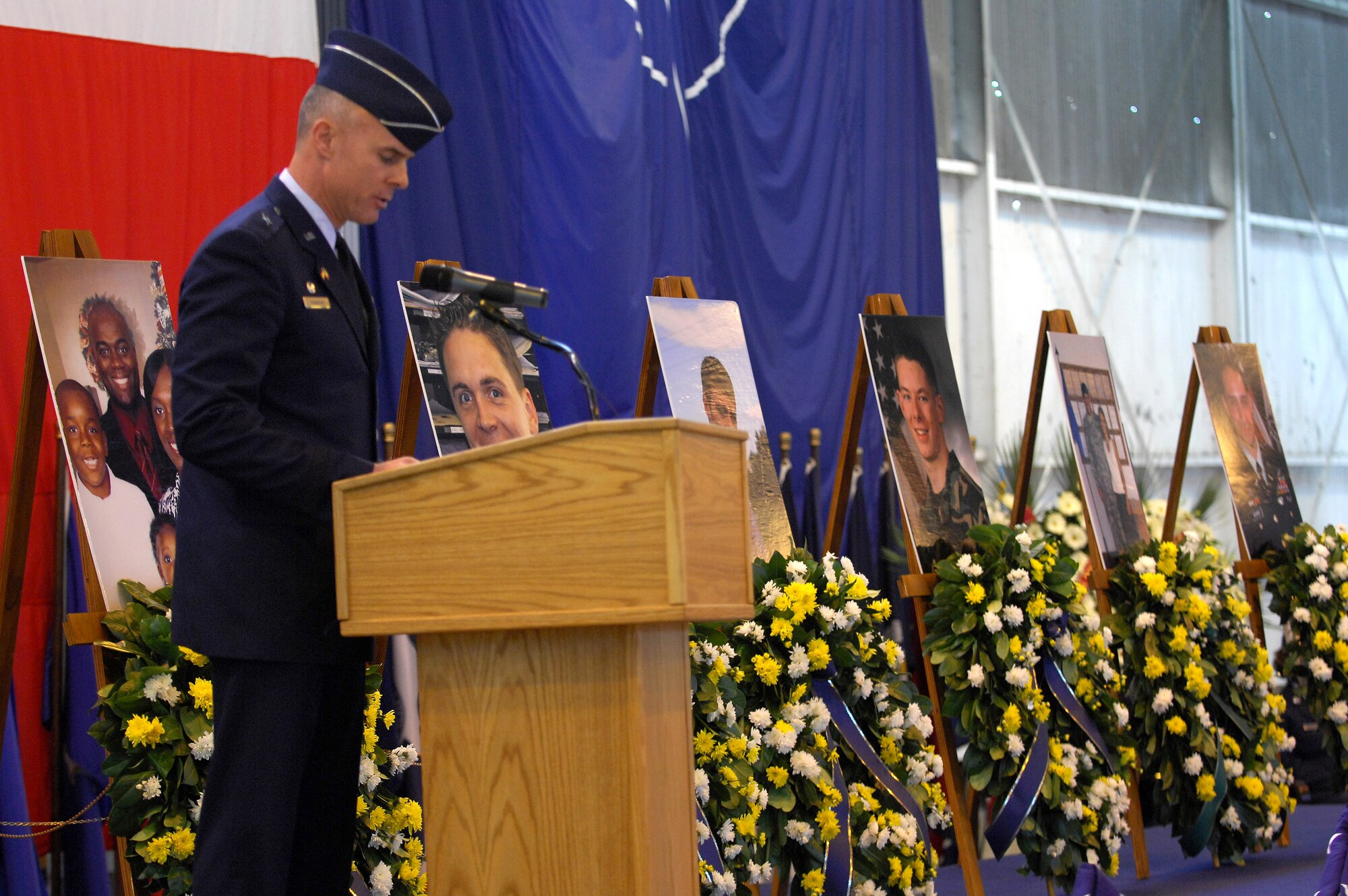 Brig. Gen. Craig A. Franklin speaks at Aviano Air Base, Italy, during a Nov. 15 memorial ceremony for the six servicemembers who lost their lives Nov. 8 when an Army UH-60 Black Hawk helicopter attached to the 1st Battalion, 214th Aviation Regiment crashed Nov. 8, 22 miles southwest of Aviano, Italy. General Franklin is the 31st Fighter Wing commander. (U.S. Air Force photo/Staff Sgt. Michael R. Holzworth) 
