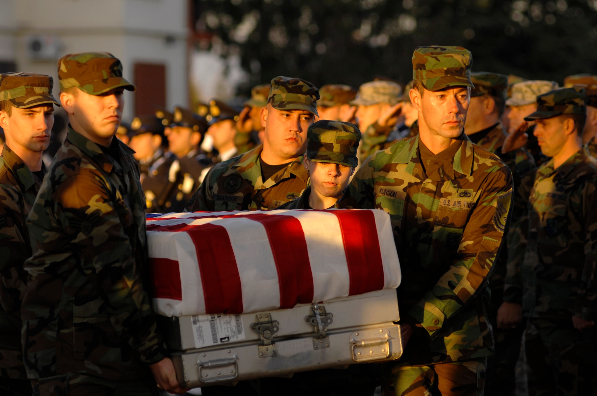 Airmen from the 31st Fighter Wing carry a fallen Airman onto a C-130 Hercules during a repatriation ceremony Nov. 13 at Aviano Air Base, Italy, for six servicemembers who were killed when an Army UH-60 Black Hawk helicopter attached to the 1st Battalion, 214th Aviation Regiment crashed Nov. 8, 22 miles southwest of Aviano, Italy. (U.S. Air Force photo/Airman 1st Class Ashley Wood) 