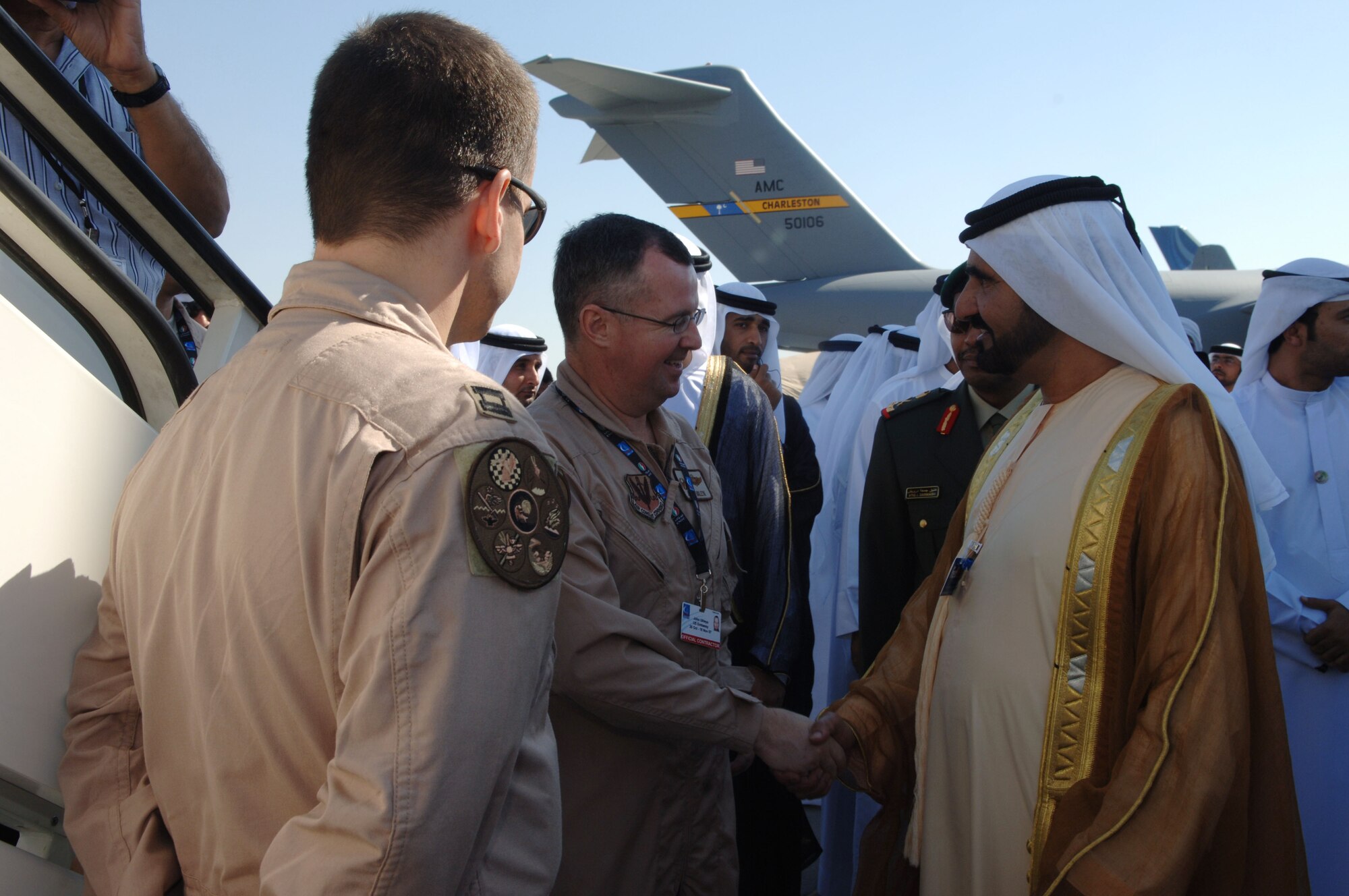 His Highness Shaikh Mohmmed bin Rashid Al Maktoum, Vice President and Prime Minister of the UAE and ruler of Dubai, shakes hands with Lt. Col. John Ukleya of the 552nd Air Control Wing,Tinker Air Force Base, Okla., Nov. 11, 2007.  Colonel Ukleya is an aircrew member on the AWACS aircraft and is in the United Arab Emirates in support of the Dubai Air Show. The United States military is providing  support for the 10th Edition of the Dubai Air Show from November 11-15, 2007.  Approximately 250 military members and a variety of U.S. Air Force and Navy aircraft will exhibit a snapshot of the U.S. military's diverse aircraft inventory. The United States military is a long-standing participant in the biennial Dubai Air Show. This opportunity has proven to be beneficial to both UAE and the U.S. as it continues to build relationships with one of our allied partners. (Air Force Photo by Tech. Sgt. Charlein C. Sheets)