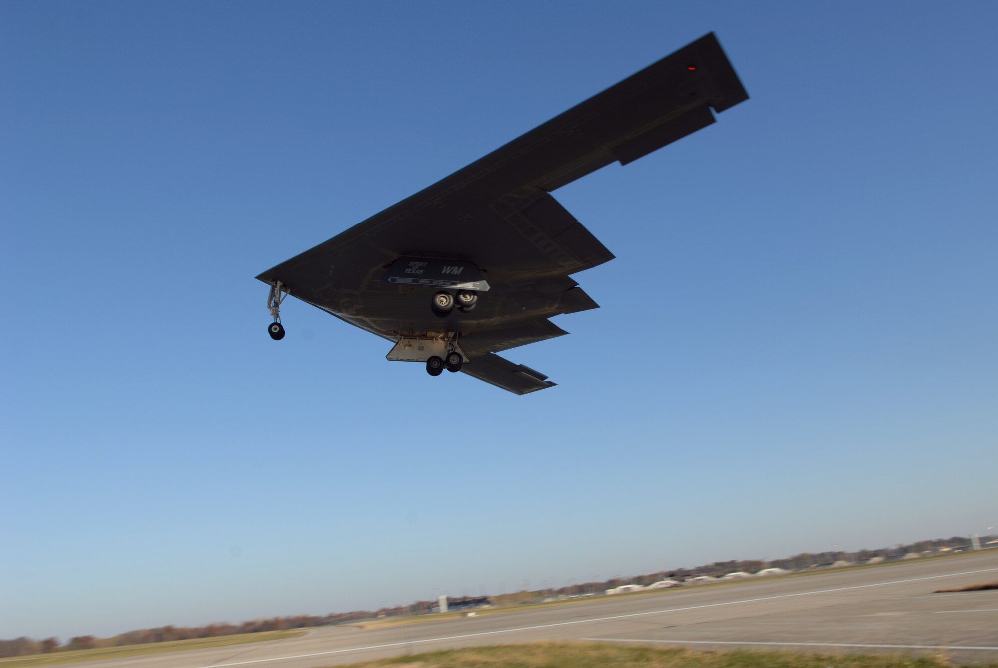 WHITEMAN AIR FORCE BASE, Mo. -- Col. Garrett Harencak, 509th Bomb Wing commander and Lt. Col. Kevin Ward, 509th BW director of staff, perform a “touch and go” in the Spirit of Texas Nov. 9. (U.S. Air Force photo/Airman 1st Class Stephen Linch)


