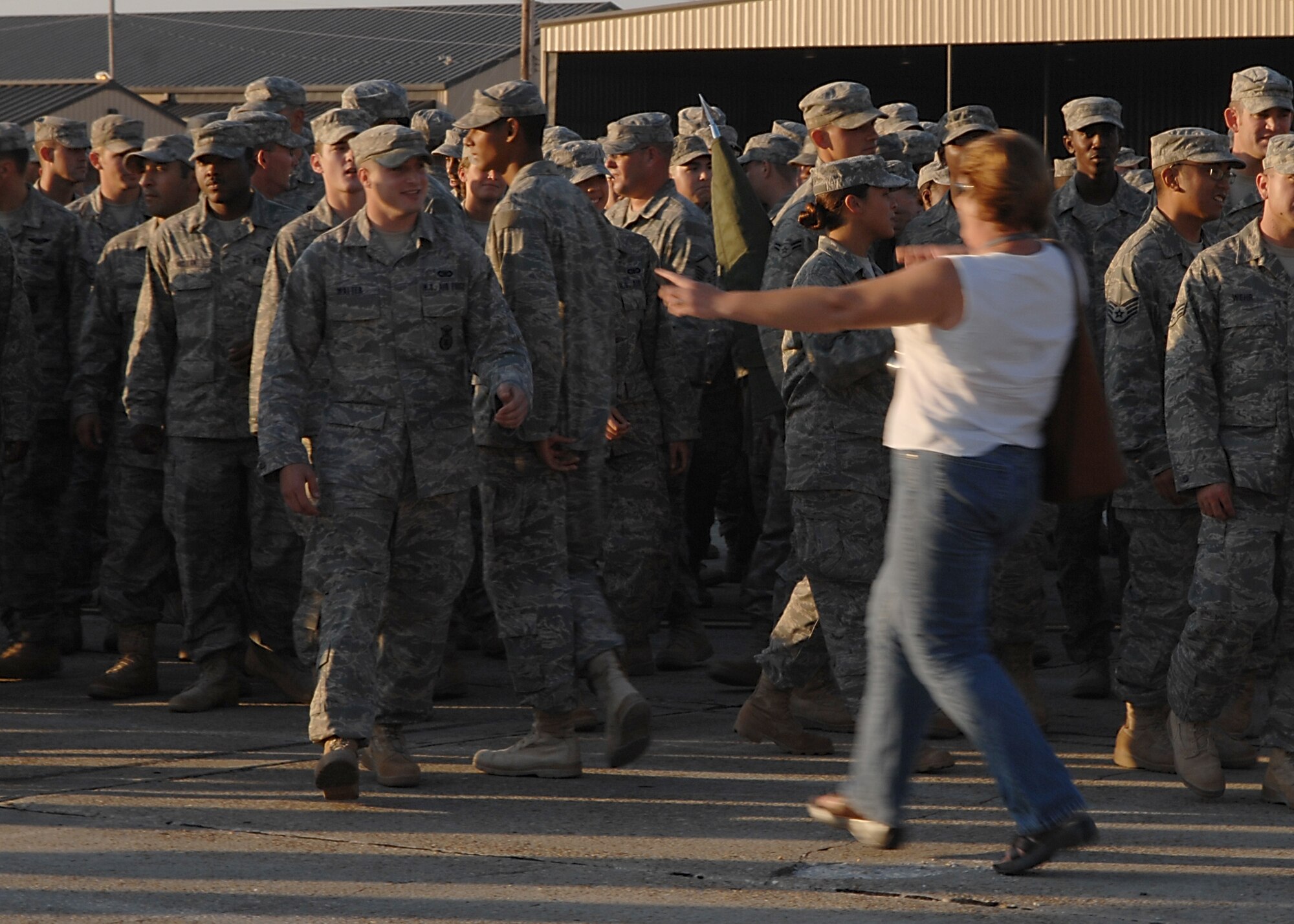 MOODY AIR FORCE BASE, Ga. -- Airmen from the 822nd Security Forces Squadron are greeted by family members as they arrive here Nov. 14 from a six-month deployment to Camp Bucca, Iraq. The 822nd SFS members were greeted by family, friends and fellow co-workers upon their return. (U.S. Air Force photo by Airman First Class Brittany Barker)