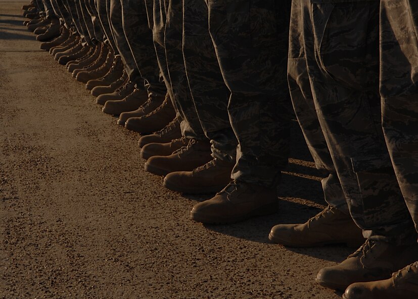 MOODY AIR FORCE BASE, Ga. -- Airmen from the 822nd Security Forces Squadron arrive here Nov. 14 from a six-month deployment to Camp Bucca, Iraq. 822nd SFS members were greeted by family, friends and fellow co-workers upon their return. (U.S. Air Force photo by Airman First Class Brittany Barker)