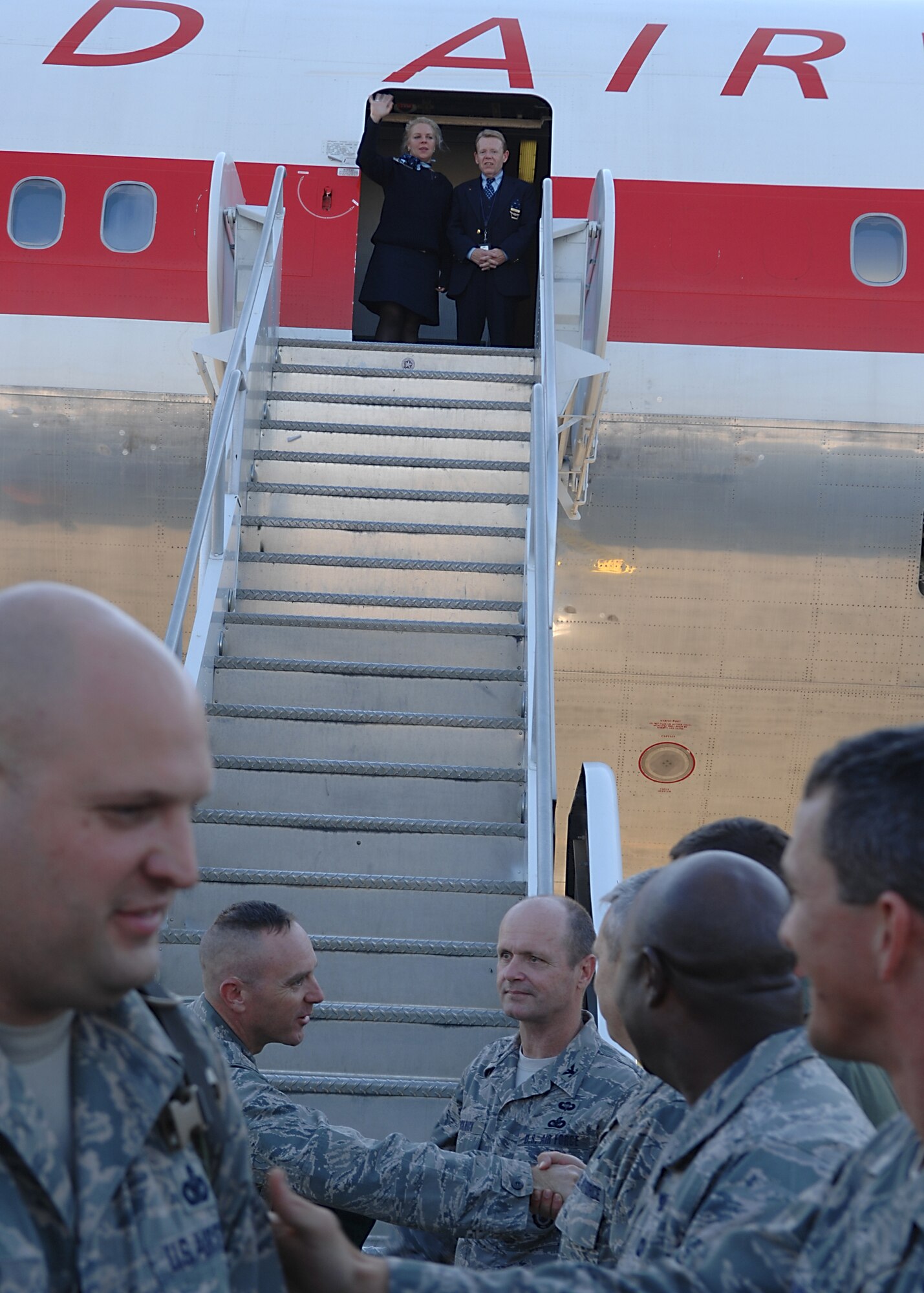 MOODY AIR FORCE BASE, Ga. -- Airmen from the 822nd Security Forces Squadron are greeted by base leadership as they arrive home Nov. 14 from a six-month deployment to Camp Bucca, Iraq. The 822nd SFS members were greeted by family, friends and fellow co-workers upon their return. (U.S. Air Force photo by Airman First Class Brittany Barker)