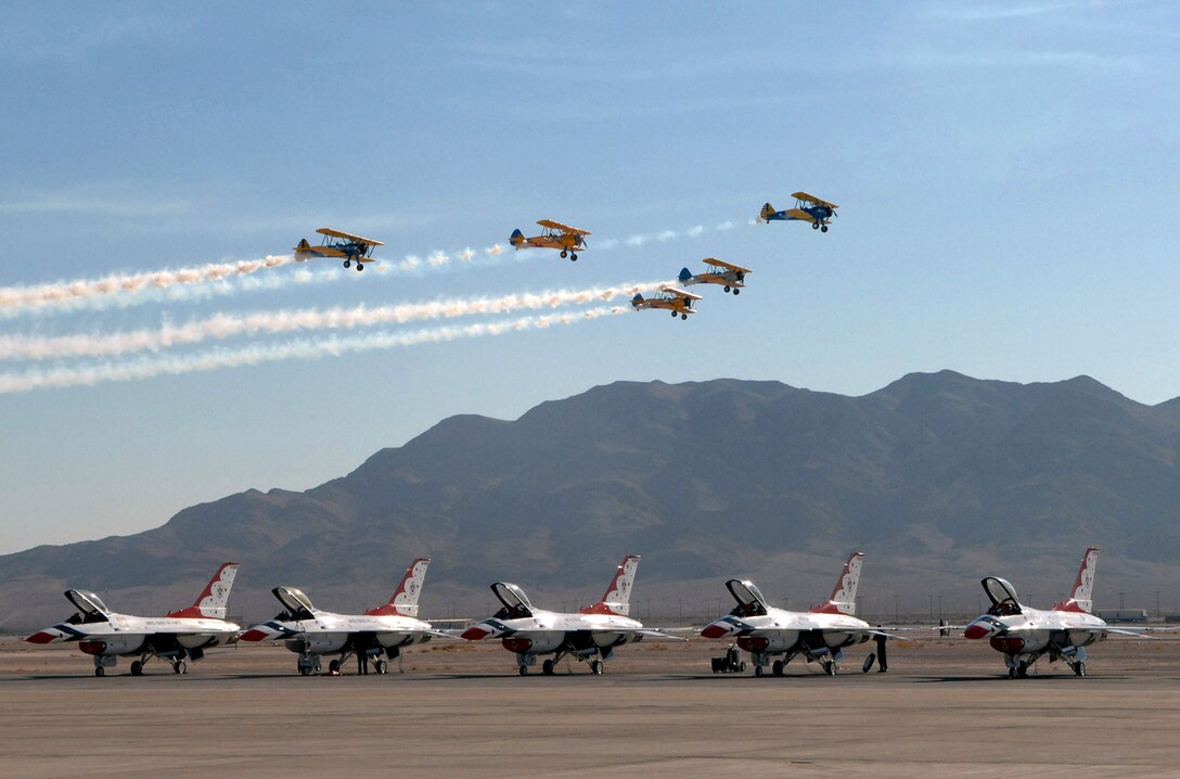 A World War I era five-ship formation performs a fly-by during Aviation Nation Air Show Nov. 10 at Nellis Air Force Base, Nev. Aviation Nation is one of the largest air shows in North America. This year's show commemorated 60 years of airpower and was the capstone event of the Air Force's yearlong 60th anniversary celebration. (U.S. Air Force photo/Staff Sgt. Jeremy Smith)