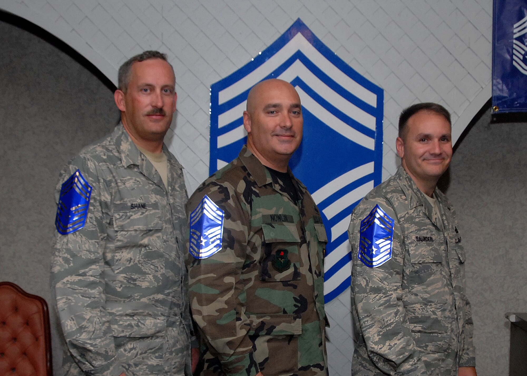 (From left to right) Senior Master Sgt. Jonathan Shane, 82nd Medical Support Squadron, Senior Master Sgt. Michael Nowlin, 373rd Training Squadron and Senior Master Sgt. Michael Nowlin, 373rd Training Squadron, were selected for promotion to the highest enlisted rank, chief master sergeant. (U.S. Air Force photo/Mike Litteken)