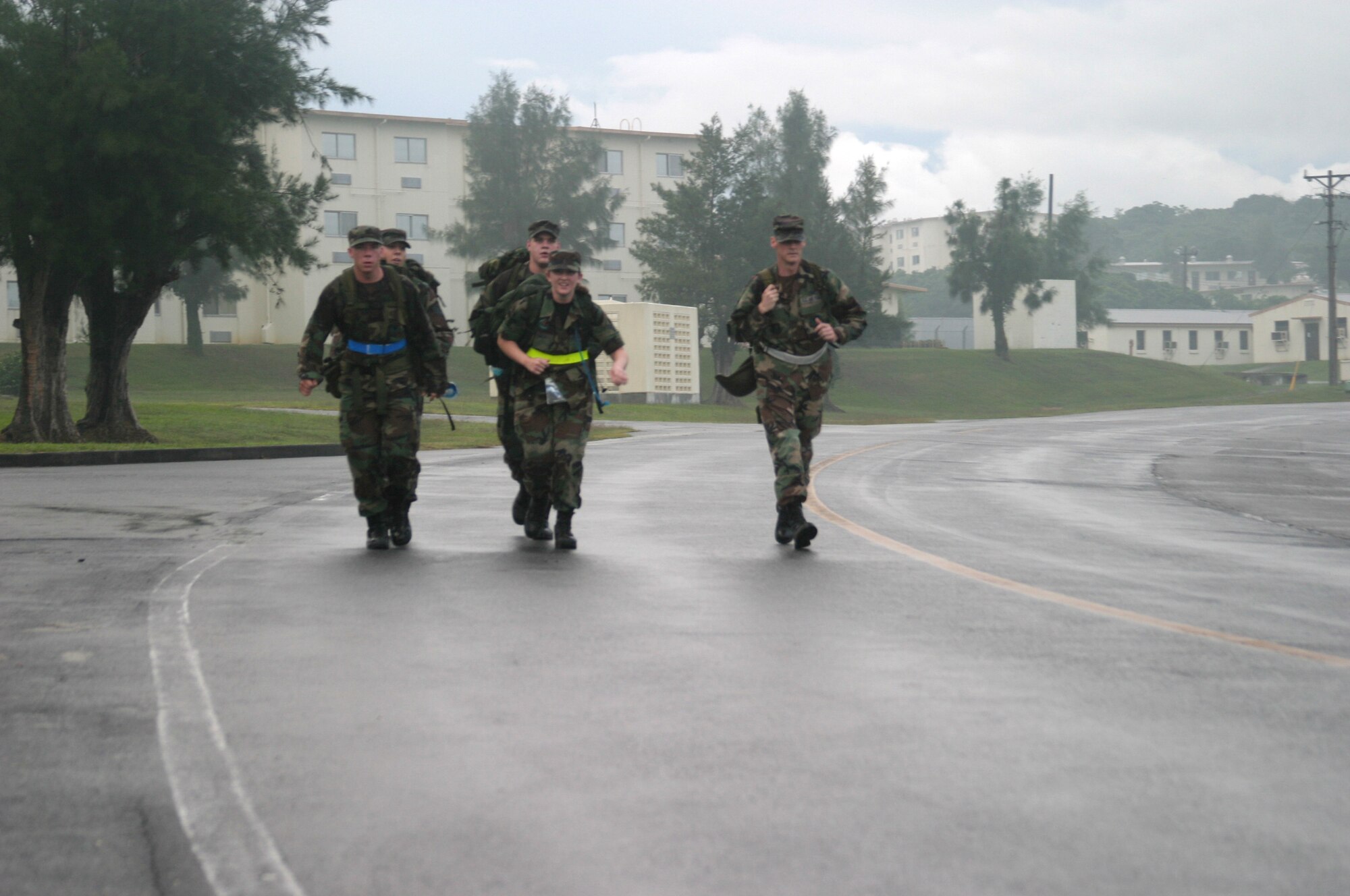 One of four fire teams from the 18th Logistics Readiness Squadron vehicle operations flight jogs the remainder of the course during their ruck march Nov. 9. At certain rally points, fire teams reviewed Airman's Manual checklists.
(U.S. Air Force/Senior Airman Nestor Cruz)
