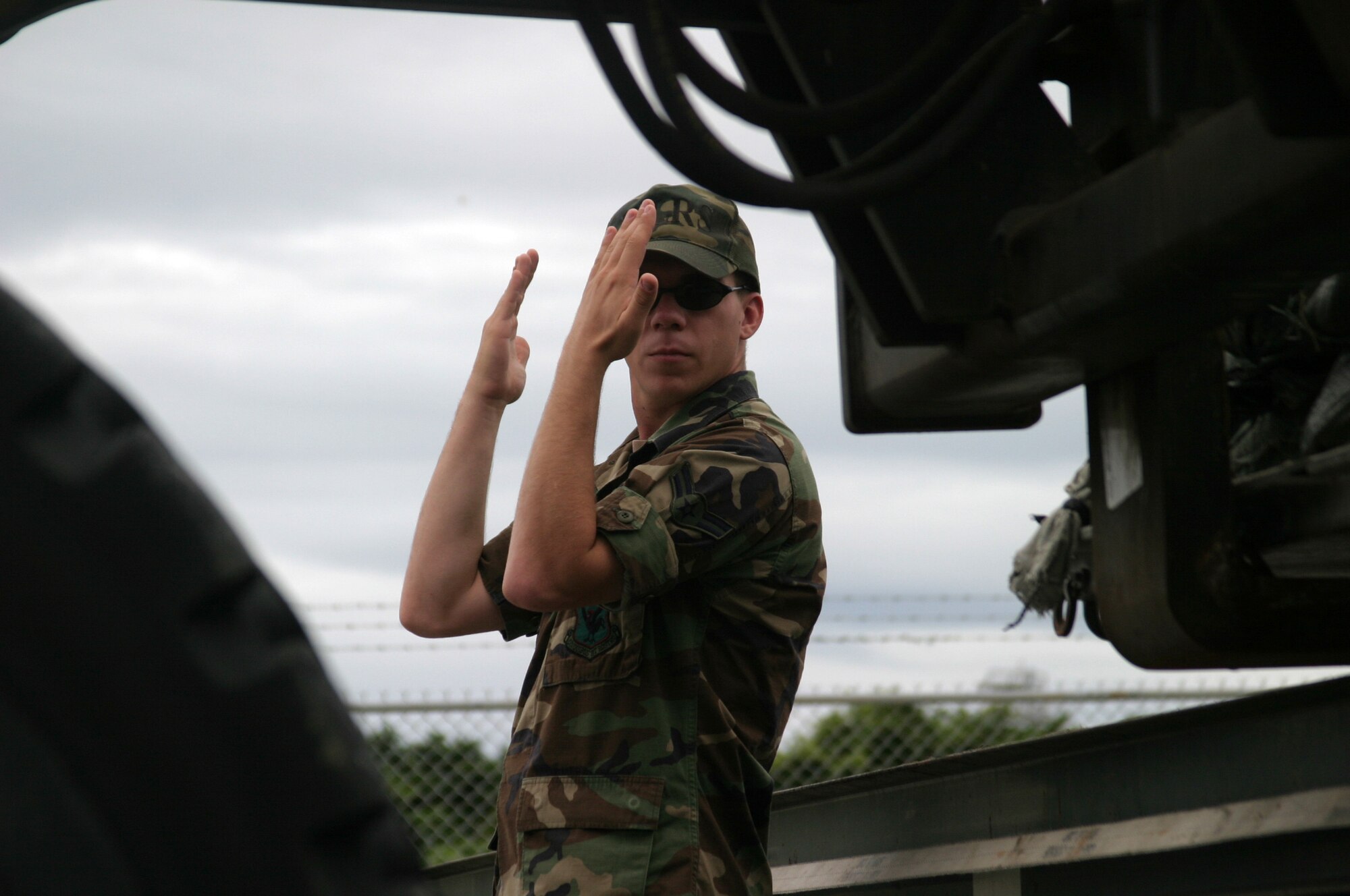 Airman 1st Class Blair Mislich, 18th Logistics Readiness Squadron vehicle operator, marshals in a coworker driving a forklift. The vehicle operations flight services 1,700 wing vehicles and supports 60,000 transportation requests monthly.
(U.S. Air Force/Senior Airman Nestor Cruz)
