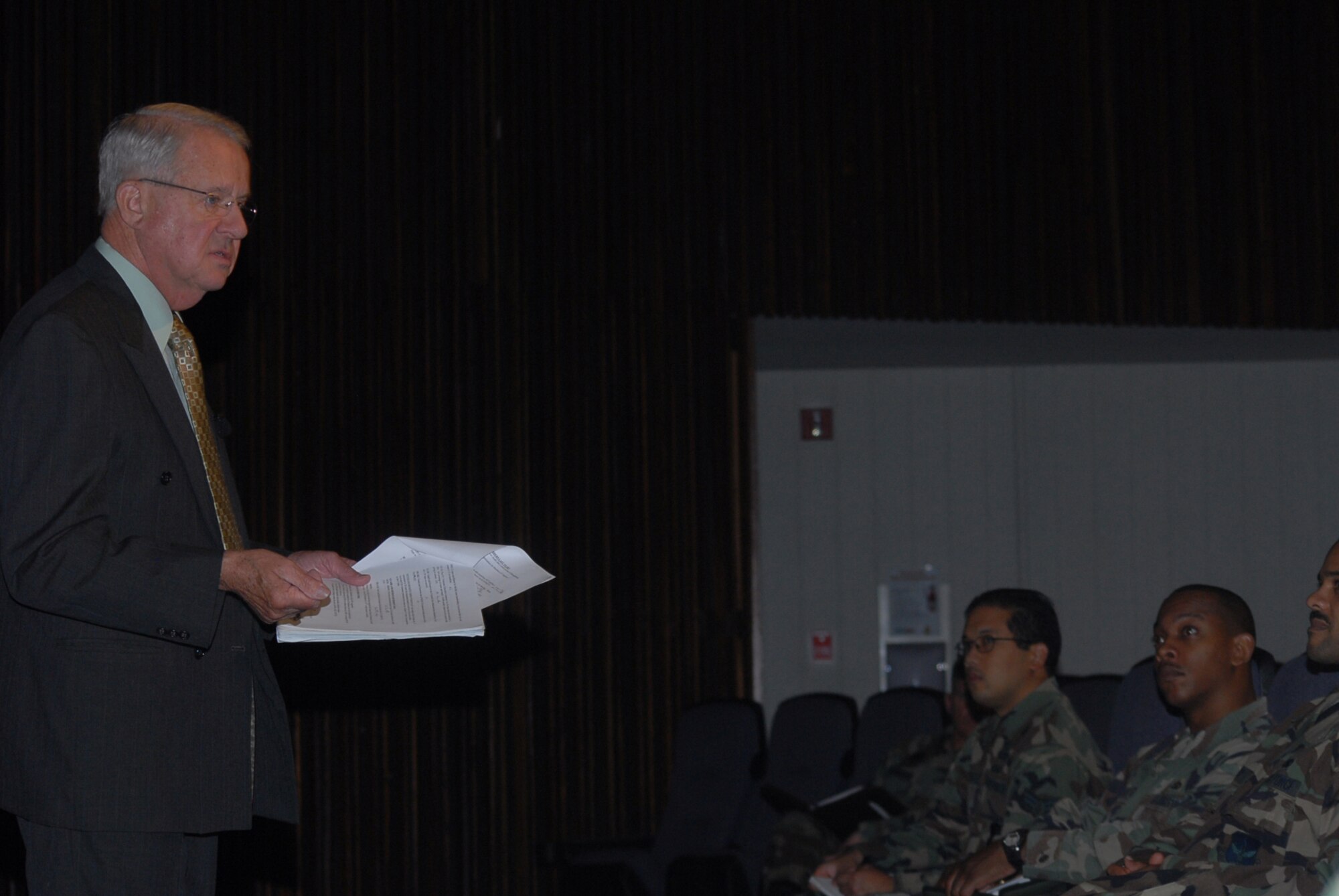 Retired Chief Master Sgt. John McCauslin, Air Force Sergeants Association international president, briefs enlisted members during his PACAF tour Nov. 8, 2007, at Kadena Air Base, Japan. He was on a PACAF tour briefing the enlisted populace on legislative matters affecting enlisted members. (U.S. Air Force photo/Senior Airman Darnell T. Cannady)