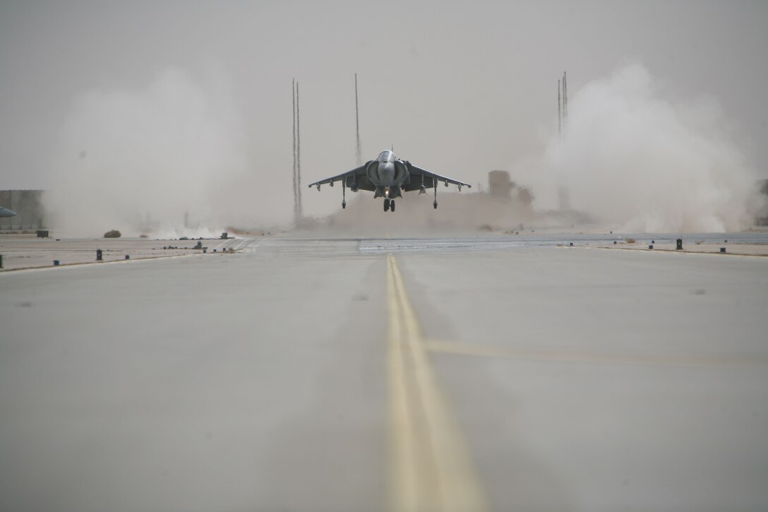 A pilot from Marine Attack Squadron 542 practices a rolling vertical landing with the AV-8B ?Harriers,? Nov. 16.  The RVL is a slower, more controlled landing used in case of inclement weather.