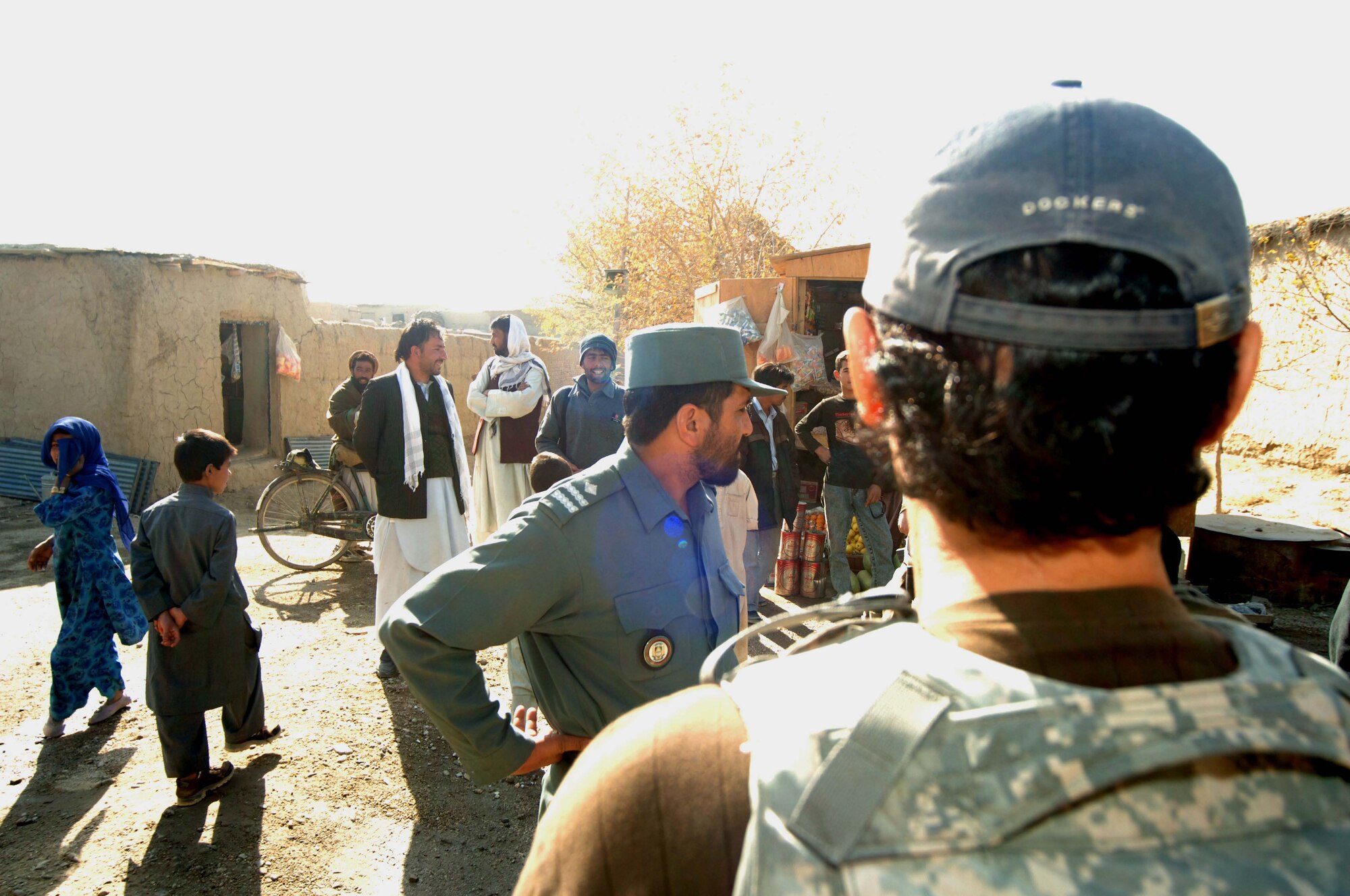 BAGRAM AIR BASE, Afghanistan -- ANP members help provide security during a recent Medical Civil Action Project. The ANP is an essential partner in efforts to provide improved services and infrastructure to the country of Afghanistan. (U.S. Air Force photo by Staff Sgt. Mike Andriacco)