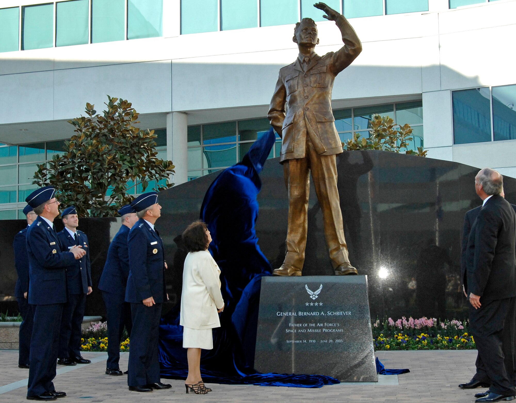 A statue of the late General Bernard A. Schriever is unveiled at a ceremony held at Los Angeles AFB, Nov. 15. General Schriever is considered the father of the Air Force’s space and missile program. The statue was donated to SMC by the Air Force Association’s Schriever Chapter. (Photo by Lou Hernandez)