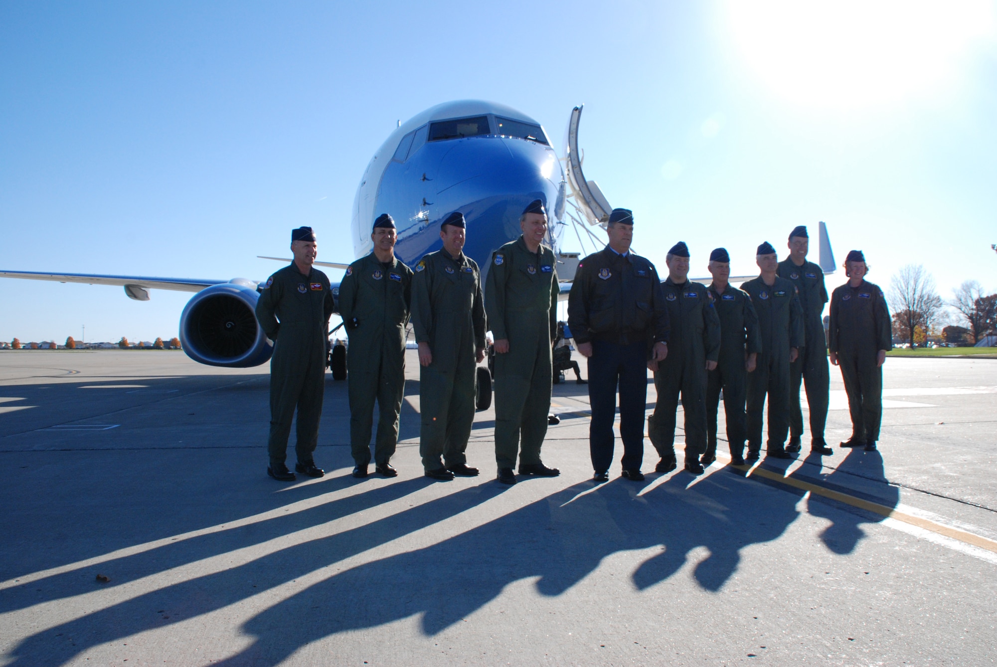Vice commanders from Air Force Reserve Command gather with Maj. Gen. Robert Duignan (center) as the 932nd Airlift Wing received its third C-40C distinguished visitor airlift plane at Scott Air Force Base recently.  The general piloted the new plane from the factory to the wing in Illinois.  Photo/Capt. Stan Paregien