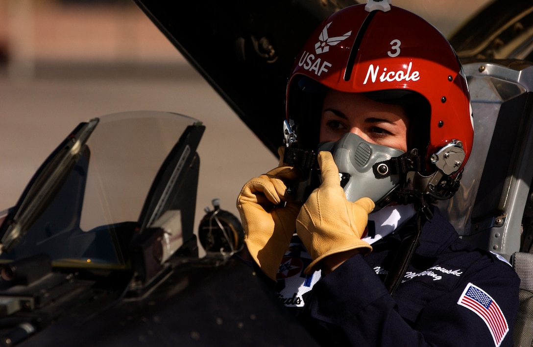 Maj. Nicole Malachowski prepares to take off for a practice sortie with the Thunderbirds in an F-16 Fighting Falcon. Major Malachowski is the Thunderbird #3 right wing pilot and just finished her two-year tour with the Air Force Demonstration Squadron. (U.S. Air Force photo/Tech. Sgt. Justin Pyle) 
