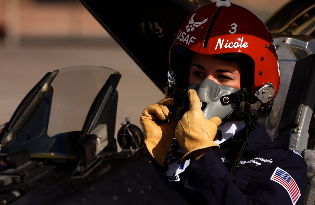 Maj. Nicole Malachowski prepares to take off for a practice sortie with the Thunderbirds in an F-16 Fighting Falcon. Major Malachowski is the Thunderbird #3 right wing pilot and just finished her two-year tour with the Air Force Demonstration Squadron. (U.S. Air Force photo/Tech. Sgt. Justin Pyle) 