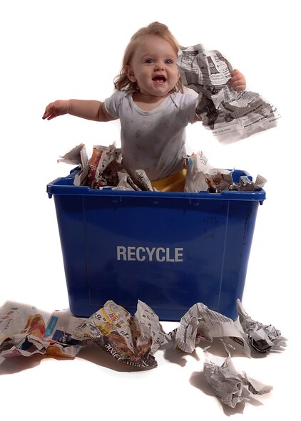 MOODY AIR FORCE BASE, Ga. -- A young member of Team Moody celebrates America Recycles day here Nov. 16.  The Moody environmental program would like to remind everyone that it is never too early to learn the joys of recycling.  (U.S. Air Force photo by Airman 1st Class Brittany Barker)