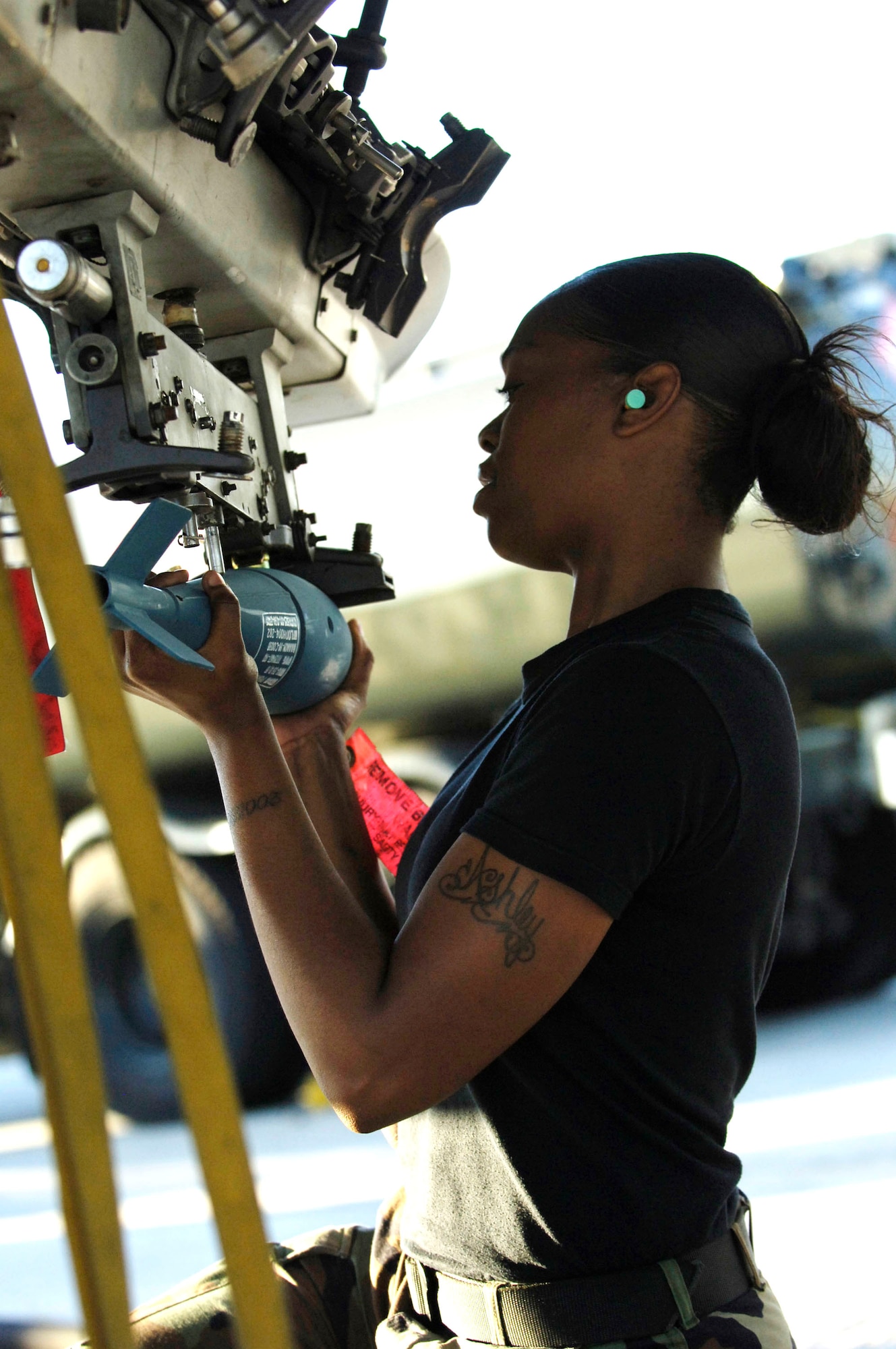 Senior Airman Ashley Hunter loads and secures a practice munition onto an A-10 Thunderbolt II Nov. 7 at MacDill Air Force Base, Fla. The bomblets are bound for the Avon Park Air Ground Training Complex as part of Exercise Atlantic Strike VI. The exercise is a U.S. Central Command Air Forces-sponsored exercise aimed at improving the coordination between joint terminal attack controllers and aircraft during urban close-air-support scenarios. Airman Hunter is a weapons load crew member from Spangdahlem Air Base, Germany. (U.S. Air Force photo/Airman 1st Class Stephenie Wade) 
