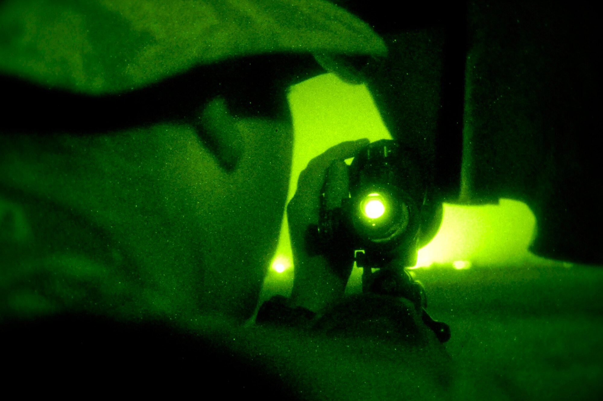 Staff Sgt. Curtis Huffman sets his sites while on top of a lookout point where his sniper team has set up surveillance for terrorist activity Nov. 14 in Iraq. The 506th Expeditionary Security Forces Squadron at Kirkuk Air Base, Iraq, houses a close precision engagement team of Air Force snipers who train as anti-sniper teams to target terrorist and insurgent snipers attacking U.S. and coalition forces in the area. Sergeant Huffman is from the 354th Security Forces Squadron at Eielson Air Force Base, Alaska, deployed to Kirkuk Air Base, Iraq, as a member of the 506th Expeditionary Security Forces Squadron. (U.S. Air Force photo/Staff Sgt. Angelique Perez) 
