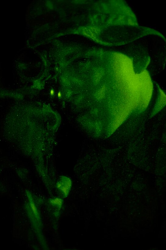 Airman 1st Class Matt Leeper sets his sites while on top of a lookout point where his sniper team has set up surveillance for terrorist activity Nov. 14 in Iraq. The 506th Expeditionary Security Forces Squadron at Kirkuk Air Base, Iraq, houses a close precision engagement team of Air Force snipers who train as anti-sniper teams to target terrorist and insurgent snipers attacking U.S. and coalition forces in the area. Airman Leeper is from the 354th Security Forces Squadron at Eielson Air Force Base, Alaska, deployed to Kirkuk Air Base, Iraq, as a member of the 506th Expeditionary Security Forces Squadron. (U.S. Air Force photo/Staff Sgt. Angelique Perez) 
