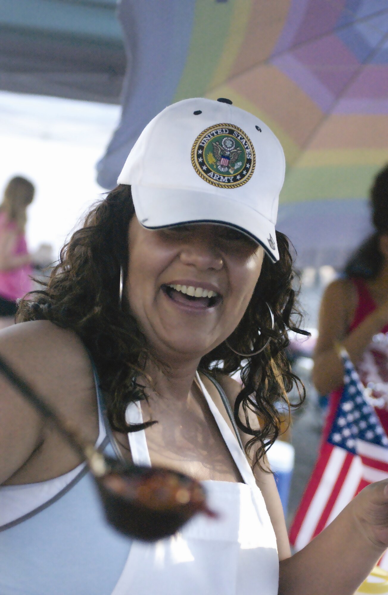 Tahlia Wesley serves up an award winning European style chili on behalf of the Army’s Family Readiness Group.  The 452nd Services Squadron hosted the first  Autumn Nights Car Show and Chili Cook-Off Nov. 3. Hundreds of people showed up to LeMay Park to take part in the celebration. For the Chili Cook-Off, the 452nd Fire Department took first place with their smokin’ chili recipe. The 452nd Communications Squadron came in second place and Tahlia Wesley, representing the Army Family Readiness group, took home third. The guests wandered around looking at the various cars on display as well as enjoyed the live entertainment. Food and beverages were also served at the event. The services squadron plans on making this the first of many more Autumn Nights to come. (U.S. Air Force photos by Staff Sgt.Amy Abbott)