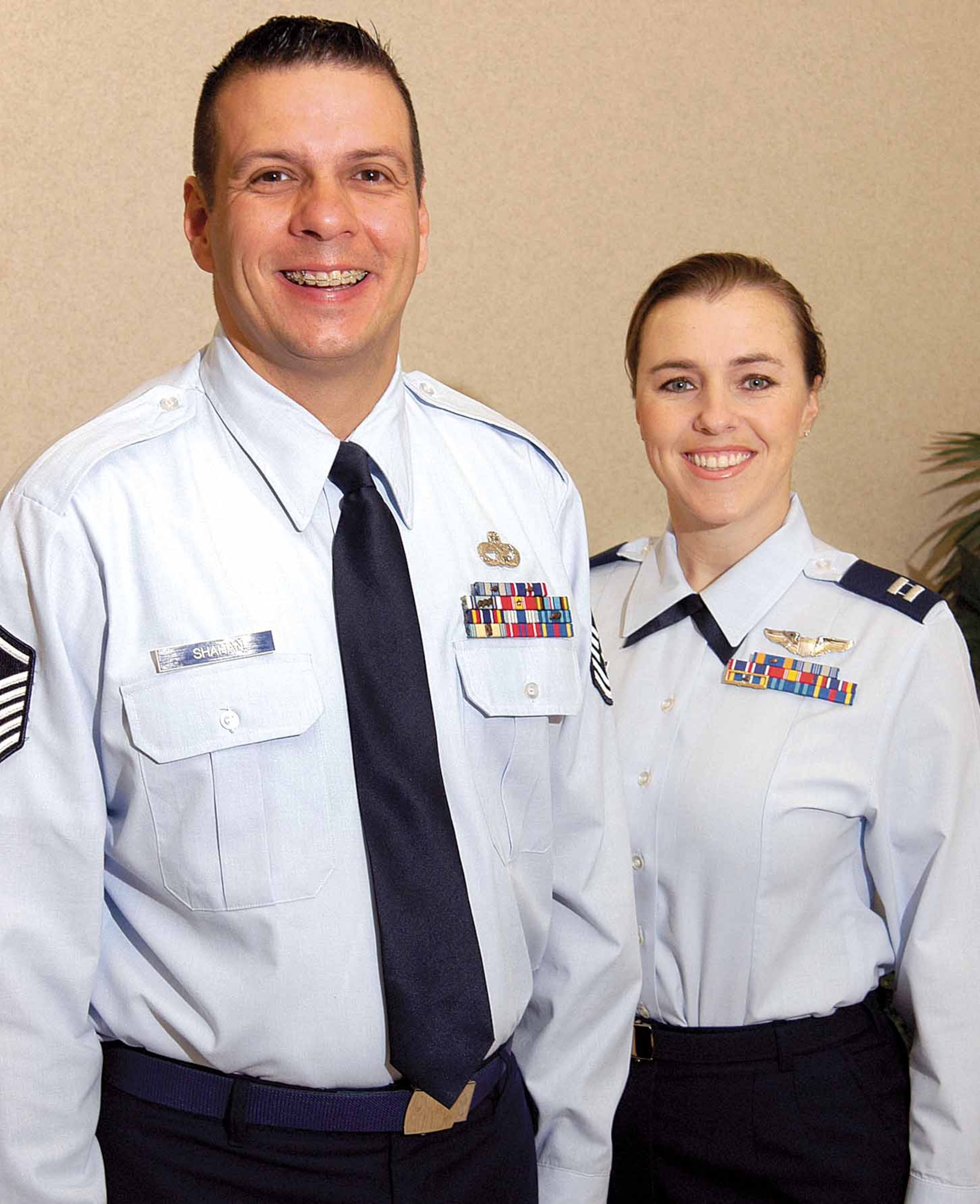 On the last work day of each month, between now and March 31, AFMC Airmen must wear a long sleeve shirt and tie or tie tab, as shown by Master Sgt. Rob Shahan and Capt. Katrina Hightower, Oklahoma City Air Logistics Center Director of Staff Protocol. (Air Force photo by Margo Wright)