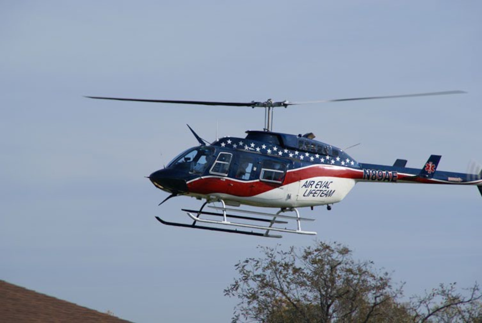 An Air Evac LifeTeam helicopter from Manchester, Tenn., lands near South Middle School to take part in the mass casualty training exercise simulating a bus crash with injured students on board. (Photo  by Philip Lorenz III)