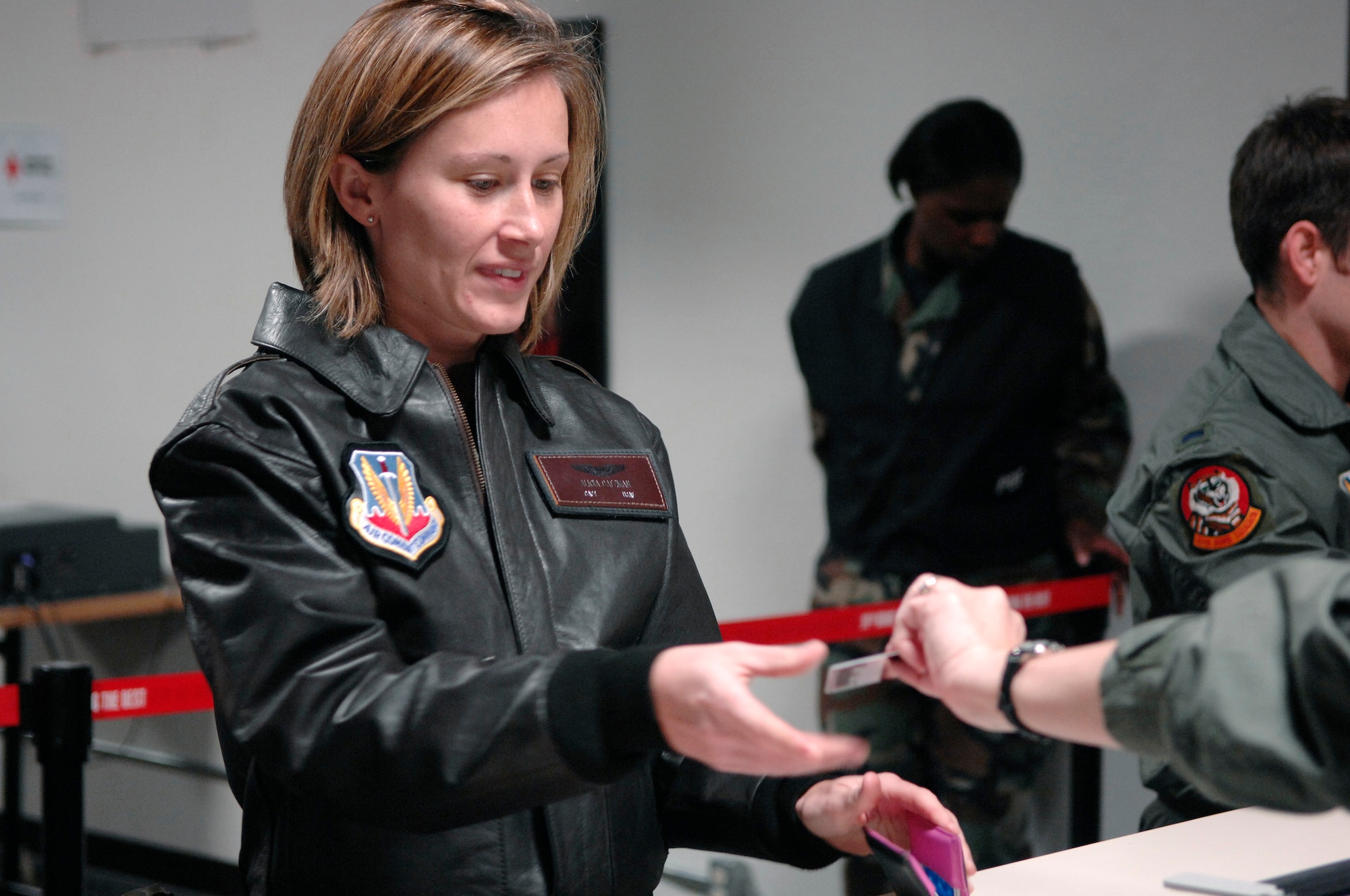 U.S. Air Force Capt. Alicia Datzman, from the 34th Bomb Squadron processes through a simulated deployment line during Operational Readiness Inspection (ORI) Coronet White 07-ACC-12 at Ellsworth Air Force Base, S.D., Nov. 15, 2007.  An Air Combat Command inspection team will use this ORI to evaluate the 28th Bomb Wing's ability to effectively and rapidly deploy.  (U.S. Air Force photo by SSgt Michael B. Keller)(Released)
