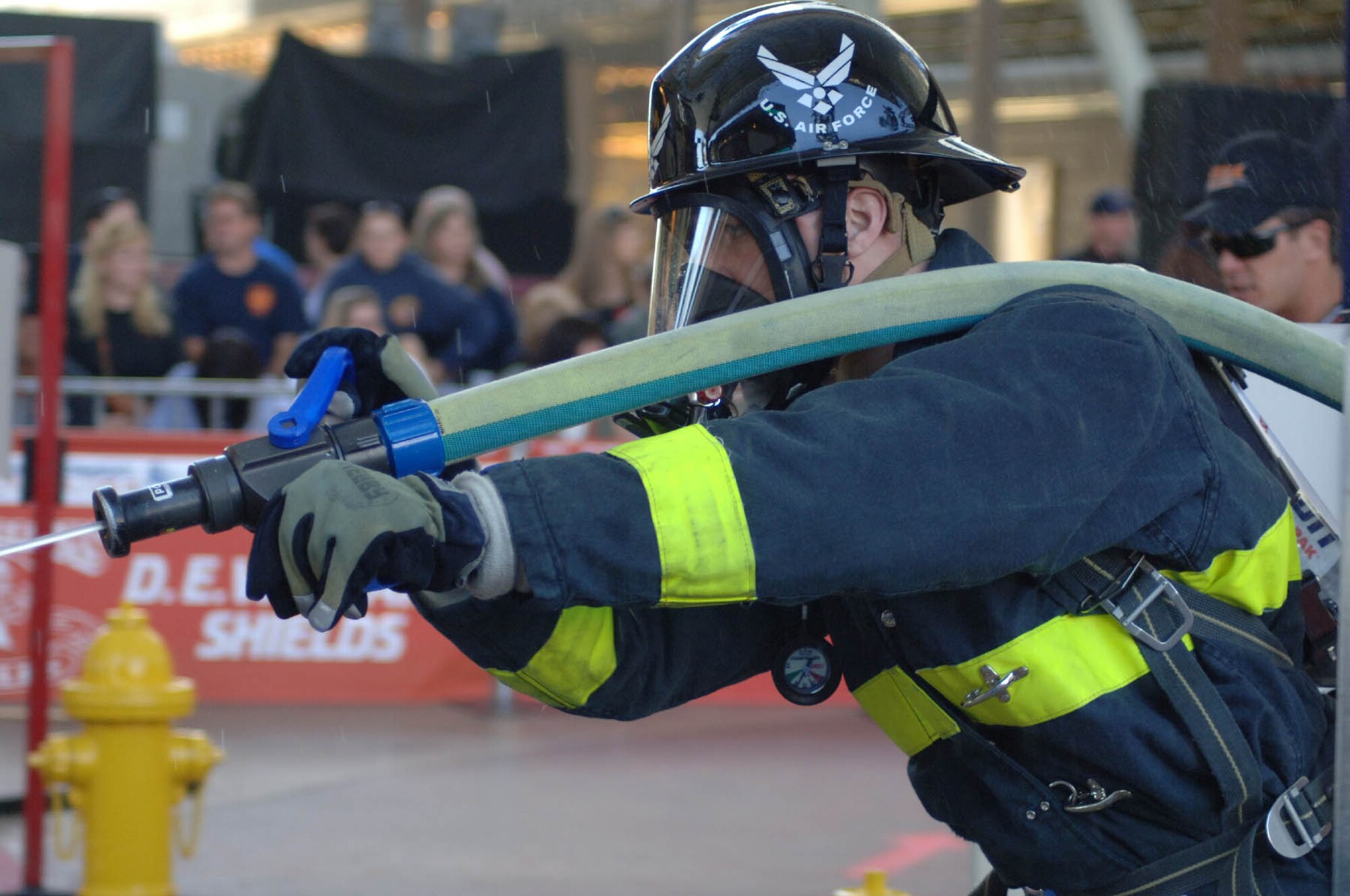 LAS VEGAS (AFPN) – Spangdahlem Air Base firefighter Staff Sgt. Jack Snyder, 52nd Civil Engineer Squadron, demonstrates his accuracy with a firehose, by hitting a volleyball-sized target with a stream of water, during the World Firefighter Combat Challenge XVI Nov. 6 in downtown Las Vegas. (U.S. Air Force photo/John Van Winkle)