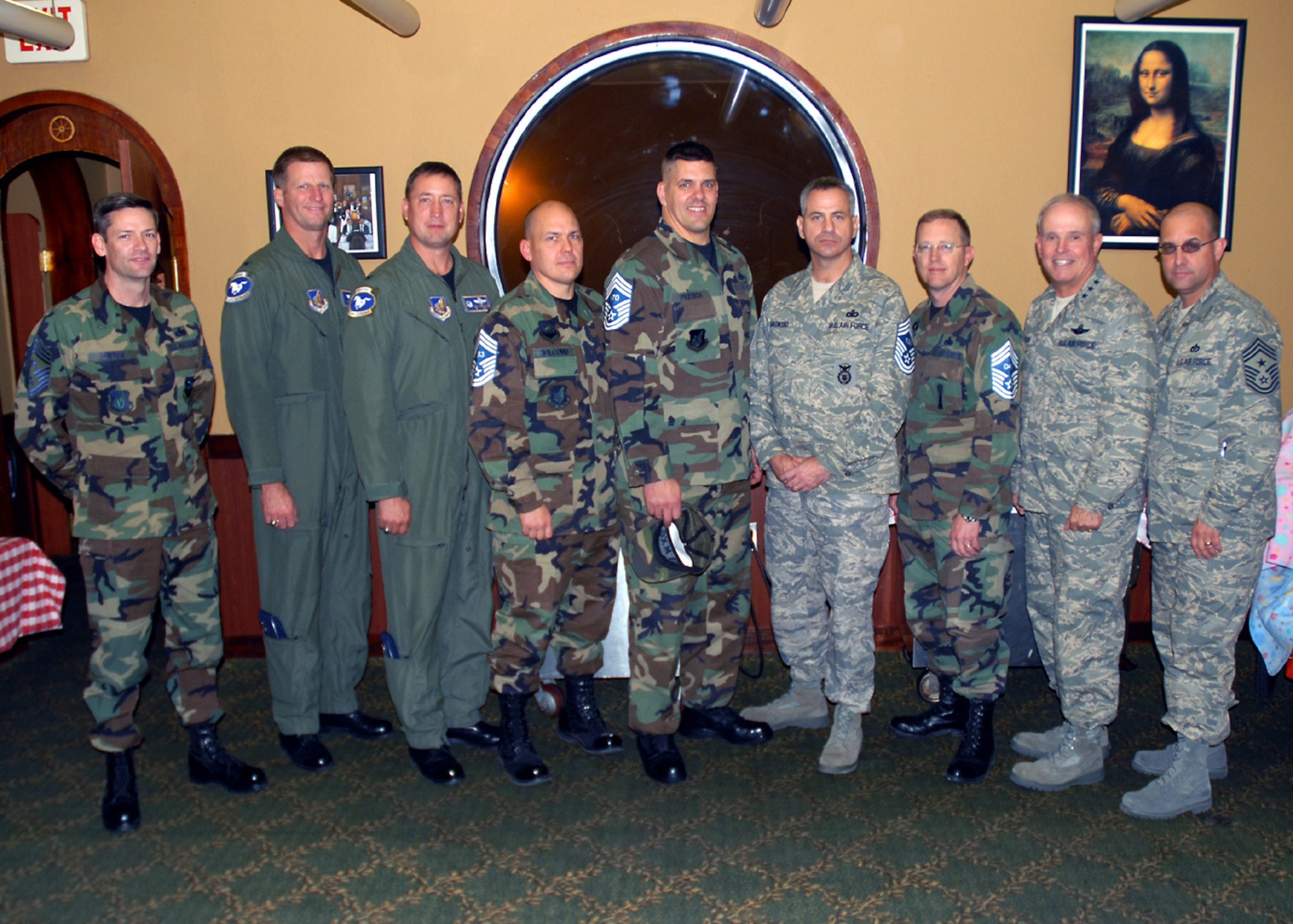 OSAN AIR BASE, Republic of Korea -- Lt. Gen. Stephen G. Wood, Commander, Seventh Air Force, (second from right), Col. Jon A. Norman, Commander, 51st Fighter Wing, (third from left), Col. Stephen S. Kempf, Vice Commander, 51st Fighter Wing, (second from left), Seventh Air Force Command Chief Master Sgt. Ray Allen, (right), and 51st Fighter Wing Command Chief Master Sgt. Darrin D. Dwyer, (left), pose with Osan Air Base's newest Chief Master Sergeant selects, (left to right), Senior Master Sgt. John M. Holcomb, 51st Civil Engineering Squadron, Senior Master Sgt. Todd G. Preisch, 51st Maintenance Group, Senior Master Sgt. David A. Makowski, 51st Security Forces Squadron, and Senior Master Sgt. Robert A. Benton, 51st Maintenance Squadron.  (U.S. Air Force photo by Senior Master Sgt. Marvin Krause)
