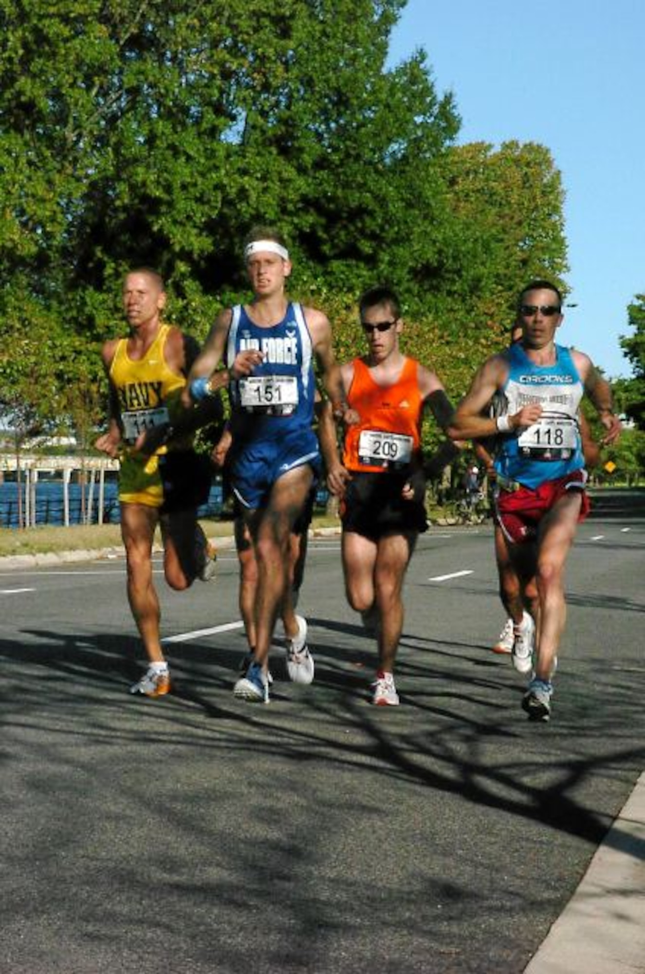 WASHINGTON --  Brian Dumm, No. 151, leads the pace of a small group during the Marine Corps Marathon on Oct. 28. Dumm, a first lieutenant with the 7th Air Force at Osan Air Base, came in sixth place overall, and first place for military participants at 2:28:27. (Photo courtesy of Marine Corps Marathon)