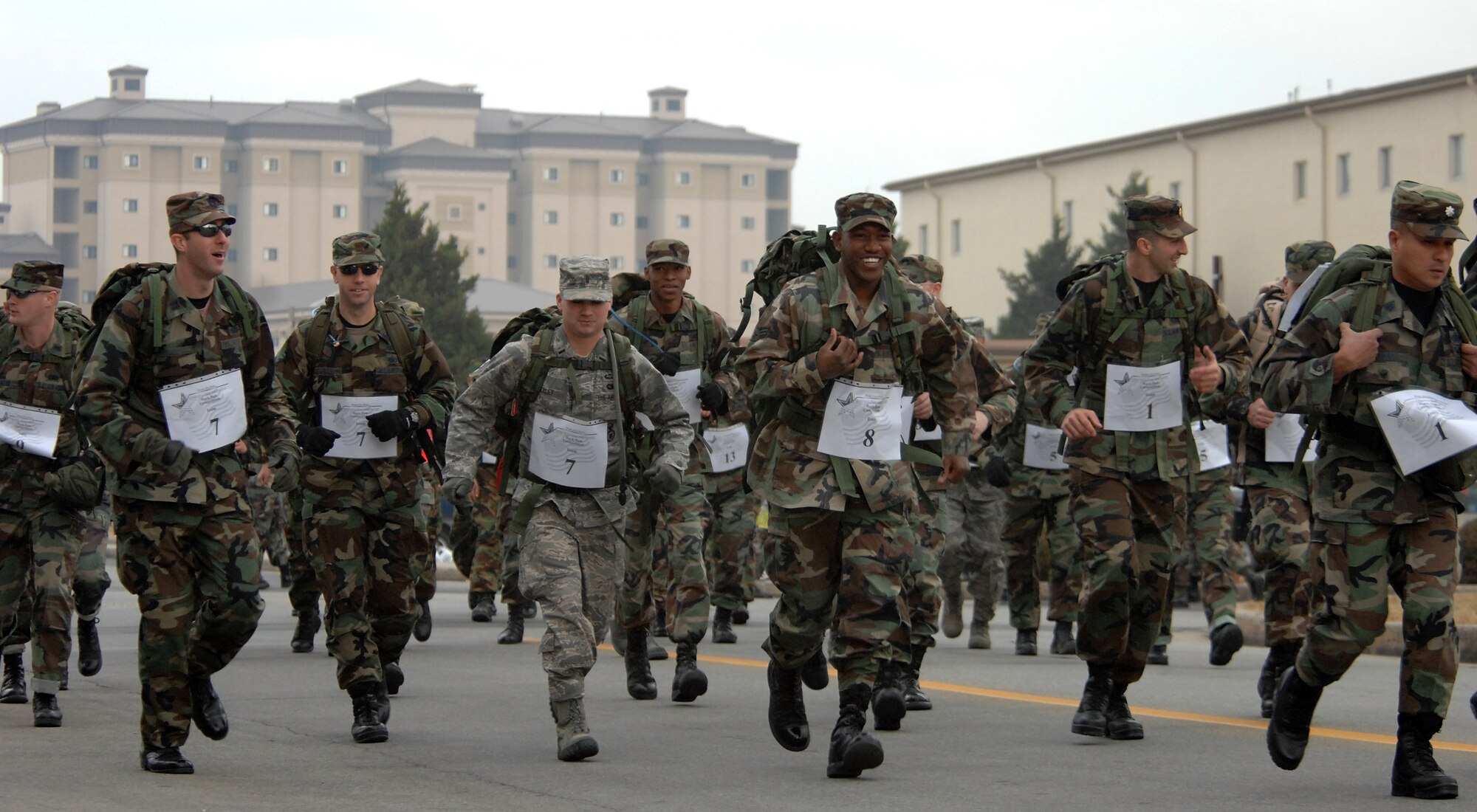 KUNSAN AIR BASE, South Korea  --  Airmen begin the 1st Annual Veterans Day Memorial Ruck/Run here Nov 17. Ten teams comprised of four members participated in a 10K march carrying 40 pound ruck sacks followed by a 1.5 mile run. 
Teams from the Republic of Korea Air Force joined U.S. teams from Kunsan and Osan Air Bases for the competition in an effort to build teamwork and camaraderie.  (U.S. Air Force photo/ TSgt Quinton T. Burris)
