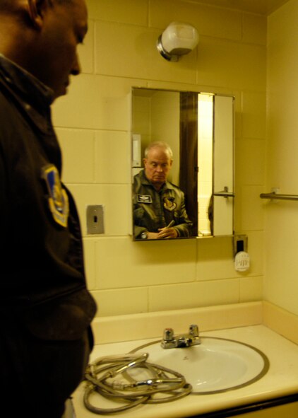 KUNSAN AIR BASE, South Korea—  Lieutenant General Stephen Wood and Col. CQ “Wolf” Brown listen to a brief on some of the dorm conditions at Kunsan here Nov. 19. General Wood was at Kunsan for a site visit and while here, he visited with Wolf Pack Airmen, toured several facilities, looked at infrastructure and met with the Gunsan City mayor. General Wood is the 7th Air Force commander and Colonel Brown is the 8th Fighter Wing commander.   (U.S. Air Force Photo/Staff Sgt Araceli Alarcon) 